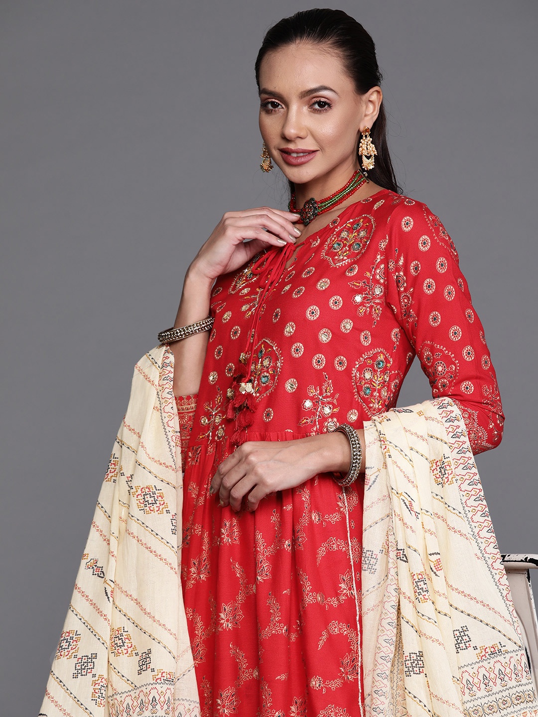Indo Era Women Red & Gold-Toned Floral Print Beads and Stone Kurta with Trousers & Dupatta
Indo Era Women Red & Gold-Toned Floral Print Beads and Stone Kurta with Trousers & Dupatta