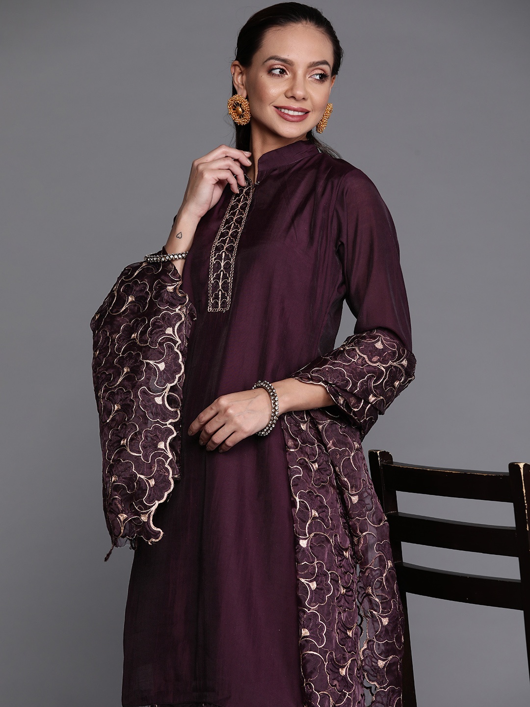Indo Era Women Purple & Beige Floral Embroidered Kurta with Trousers & Dupatta
Indo Era Women Purple & Beige Floral Embroidered Kurta with Trousers & Dupatta