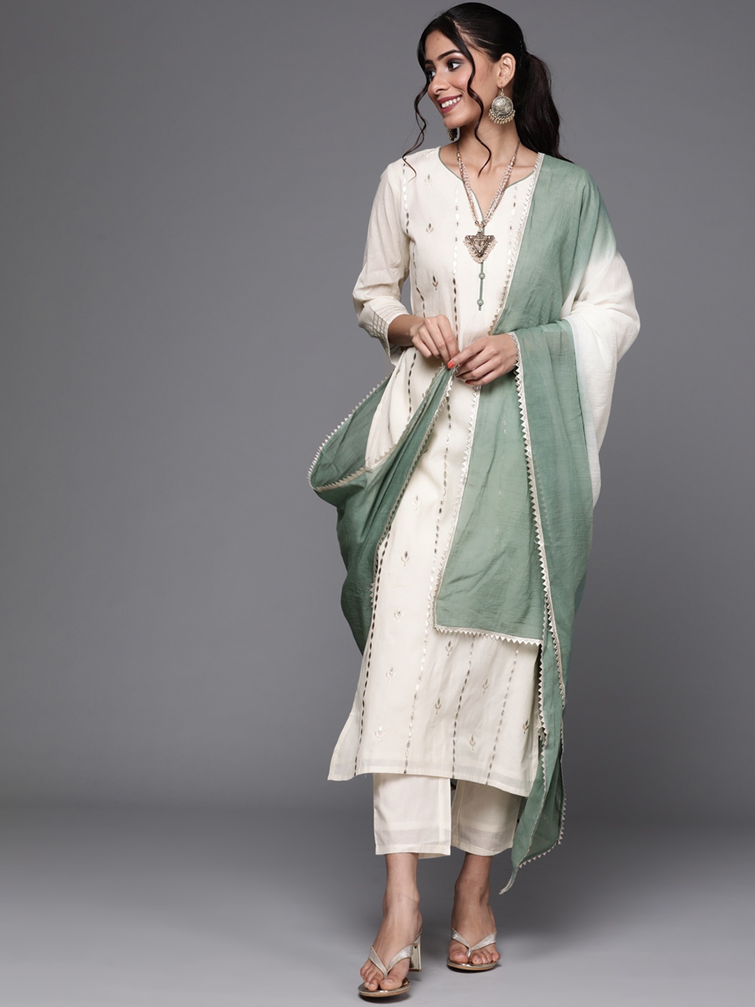 Libas Women Off White Floral Mirror Embroidered Pure Cotton Kurta with Trousers & Dupatta
Libas Women Off White Floral Mirror Embroidered Pure Cotton Kurta with Trousers & Dupatta