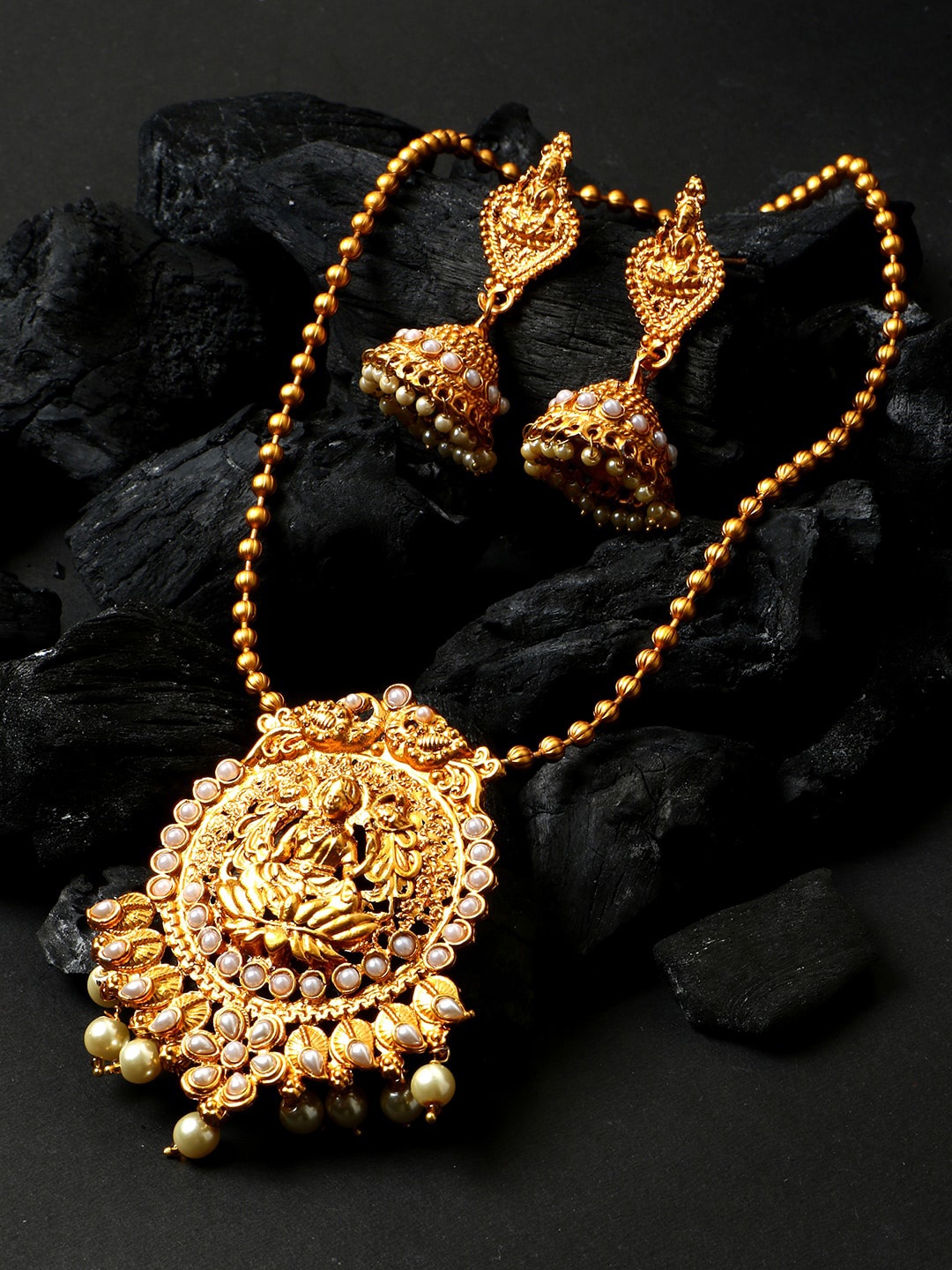 ANIKAS CREATION Gold-Plated White Stone-Studded & Beaded Matte Finish Goddess Lakshmi Jewellery Set
ANIKAS CREATION Gold-Plated White Stone-Studded & Beaded Matte Finish Goddess Lakshmi Jewellery Set