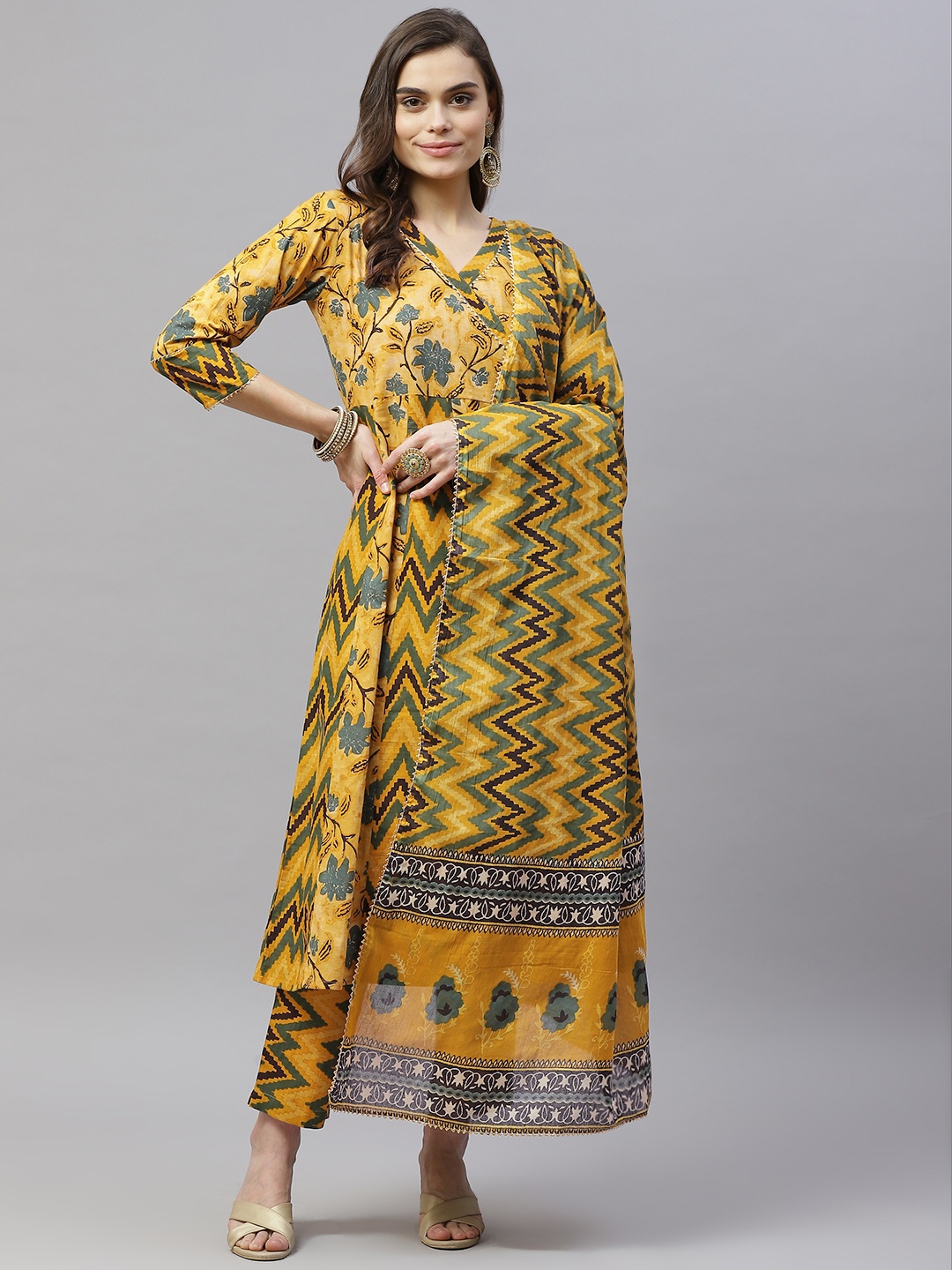 Indibelle Women Mustard Yellow Floral Printed Angrakha Gotta Patti Pure Cotton Kurta Set
Indibelle Women Mustard Yellow Floral Printed Angrakha Gotta Patti Pure Cotton Kurta Set