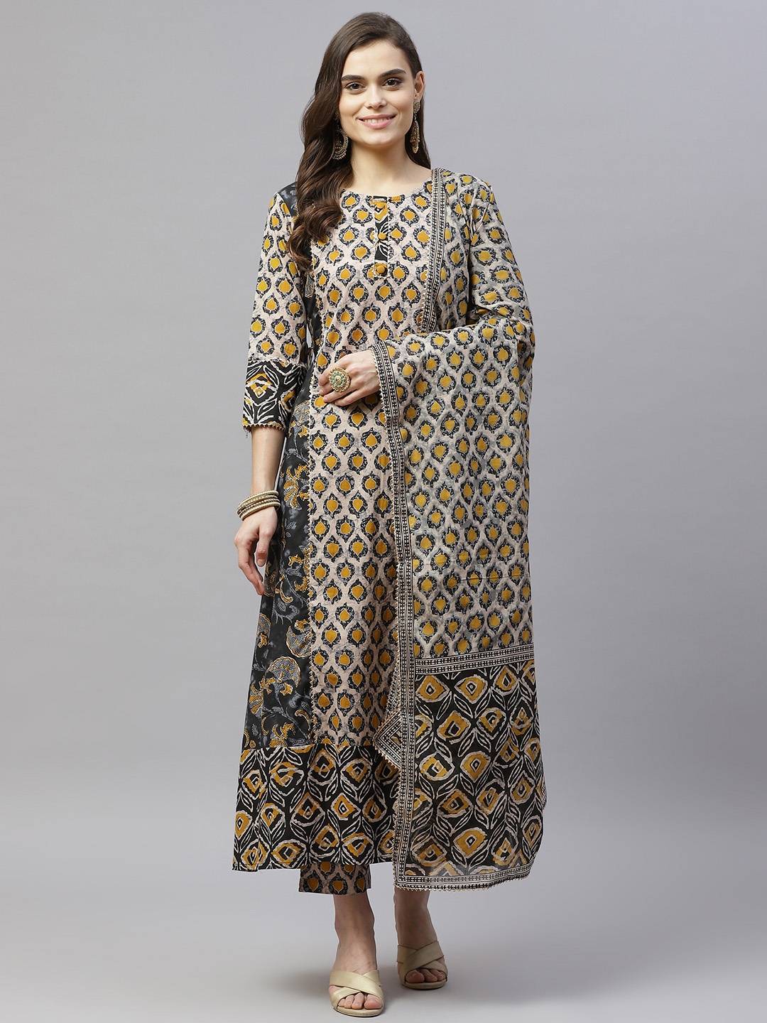 Indibelle Women Beige Printed Panelled Pure Cotton Kurta with Trousers & With Dupatta
Indibelle Women Beige Printed Panelled Pure Cotton Kurta with Trousers & With Dupatta