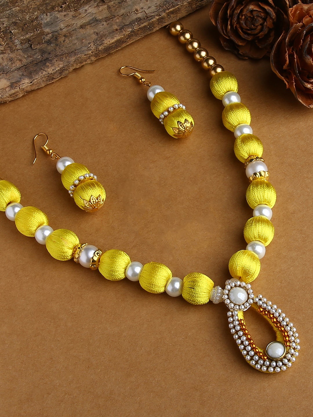 AKSHARA Girls Gold-Plated Yellow & White Stones-Studded & Beaded Silk Thread Jewellery Set
AKSHARA Girls Gold-Plated Yellow & White Stones-Studded & Beaded Silk Thread Jewellery Set