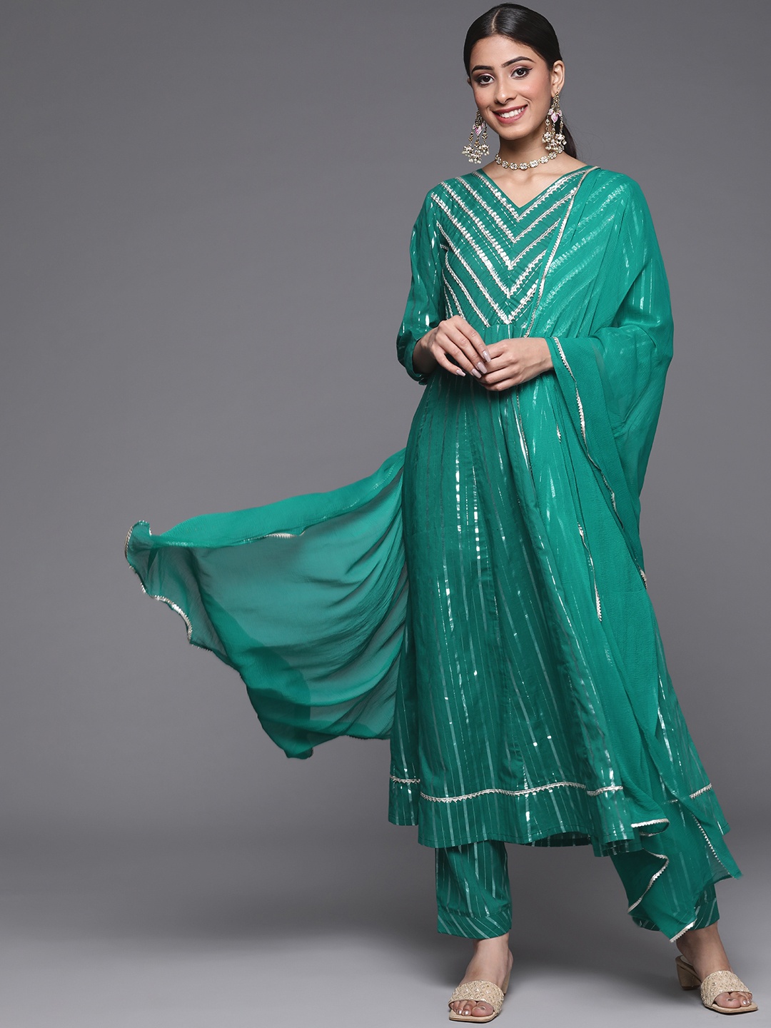 Varanga Women Green Striped Gotta Patti Pure Cotton Kurta with Trousers & With Dupatta
Varanga Women Green Striped Gotta Patti Pure Cotton Kurta with Trousers & With Dupatta