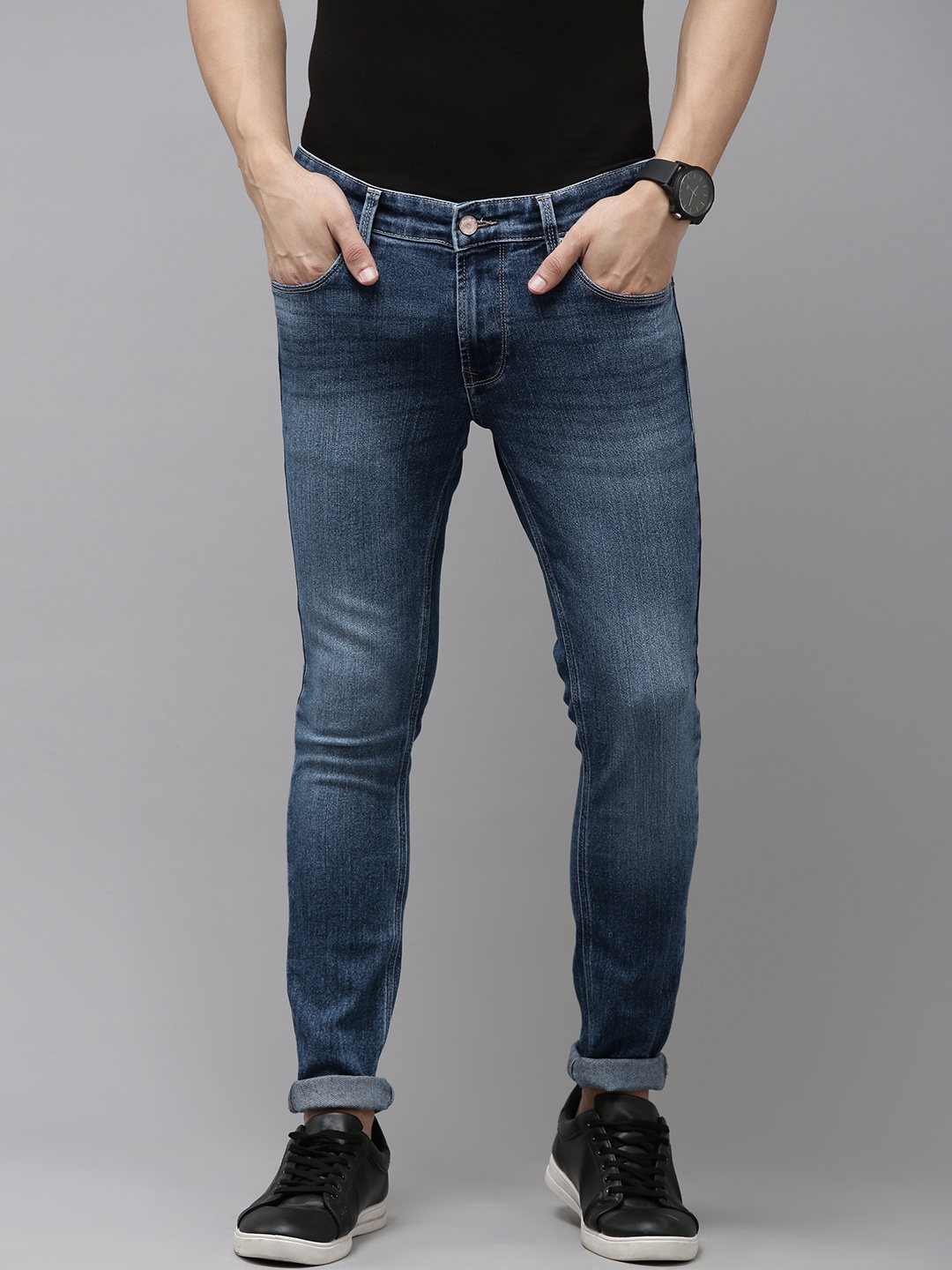

SPYKAR Men Blue Super Skinny Fit Low-Rise Tapered Leg Light Fade Stretchable Jeans