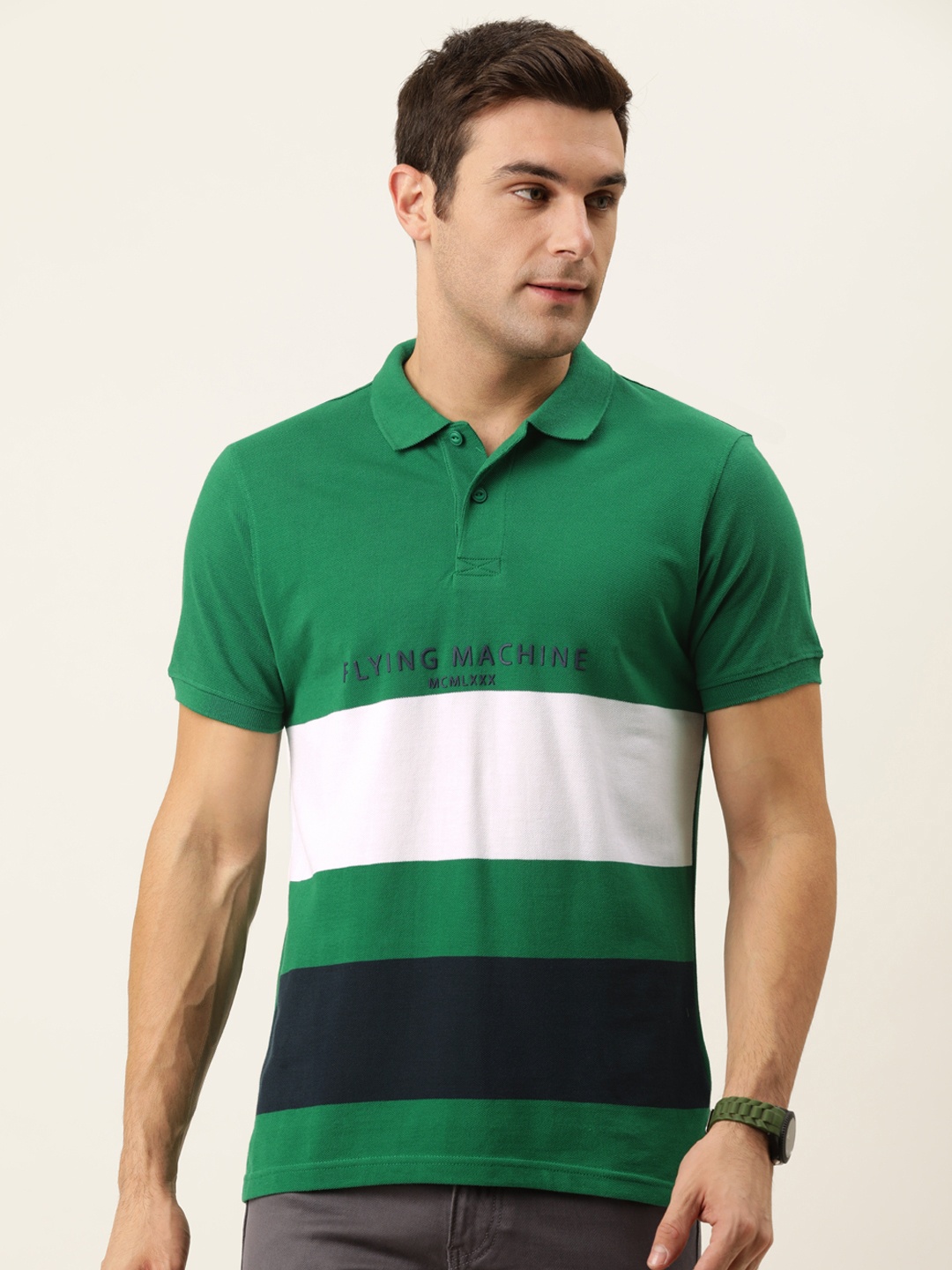 Flying Machine Men Green & White Colourblocked Polo Collar Slim Fit Pure Cotton T-shirt
Flying Machine Men Green & White Colourblocked Polo Collar Slim Fit Pure Cotton T-shirt