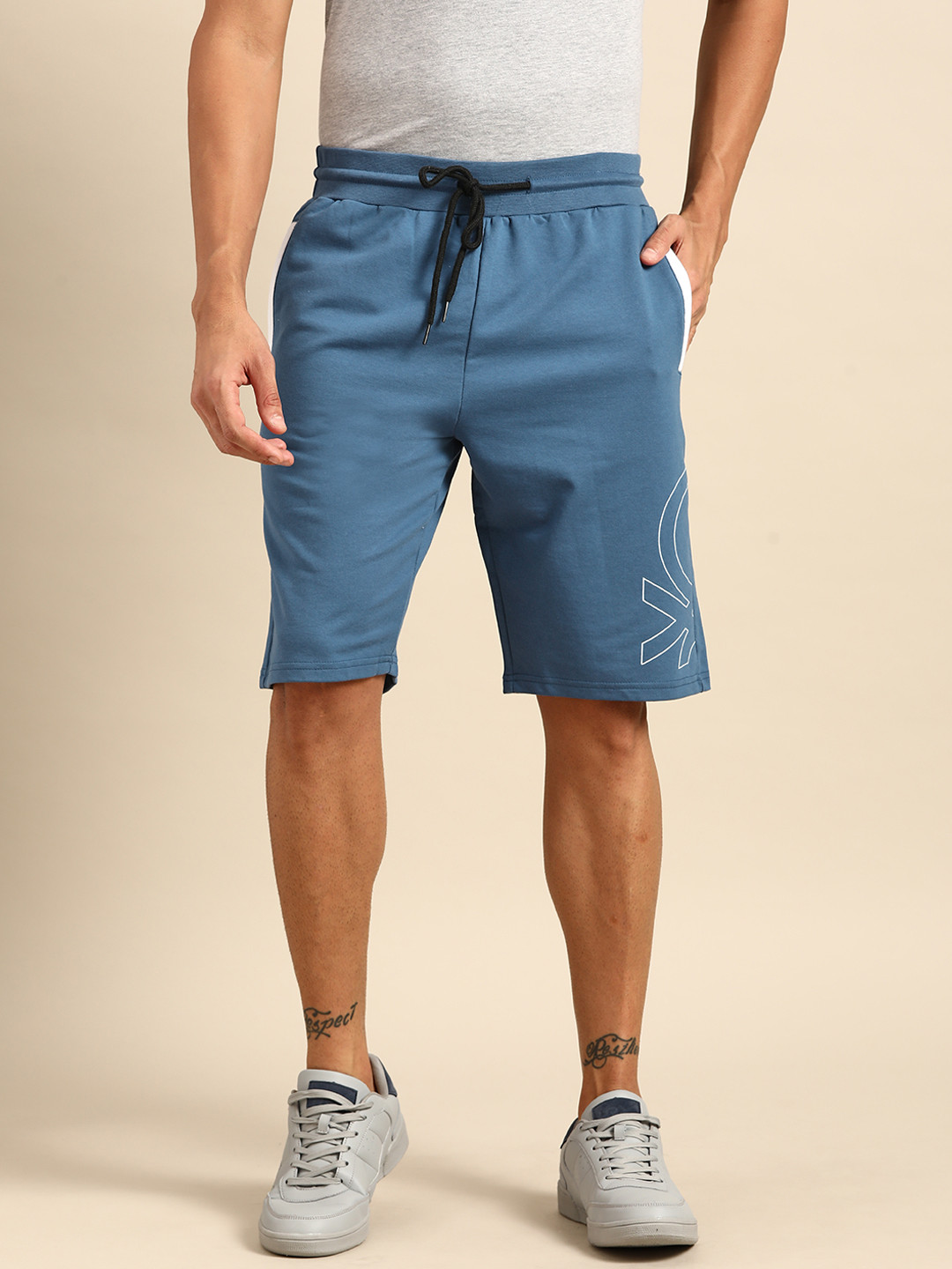 United Colors of Benetton Men Teal Blue Brand Logo Printed Shorts 
United Colors of Benetton Men Teal Blue Brand Logo Printed Shorts