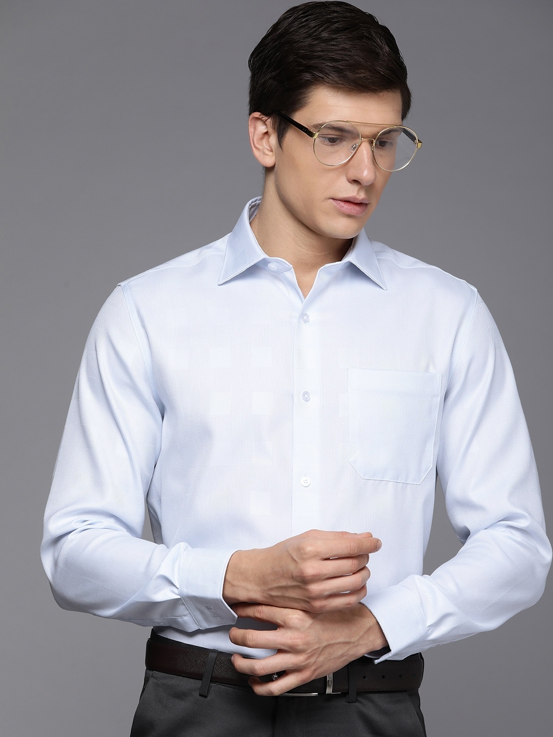 Louis Philippe Men Blue Classic Textured Opaque Self Design Pure Cotton Formal Shirt
Louis Philippe Men Blue Classic Textured Opaque Self Design Pure Cotton Formal Shirt