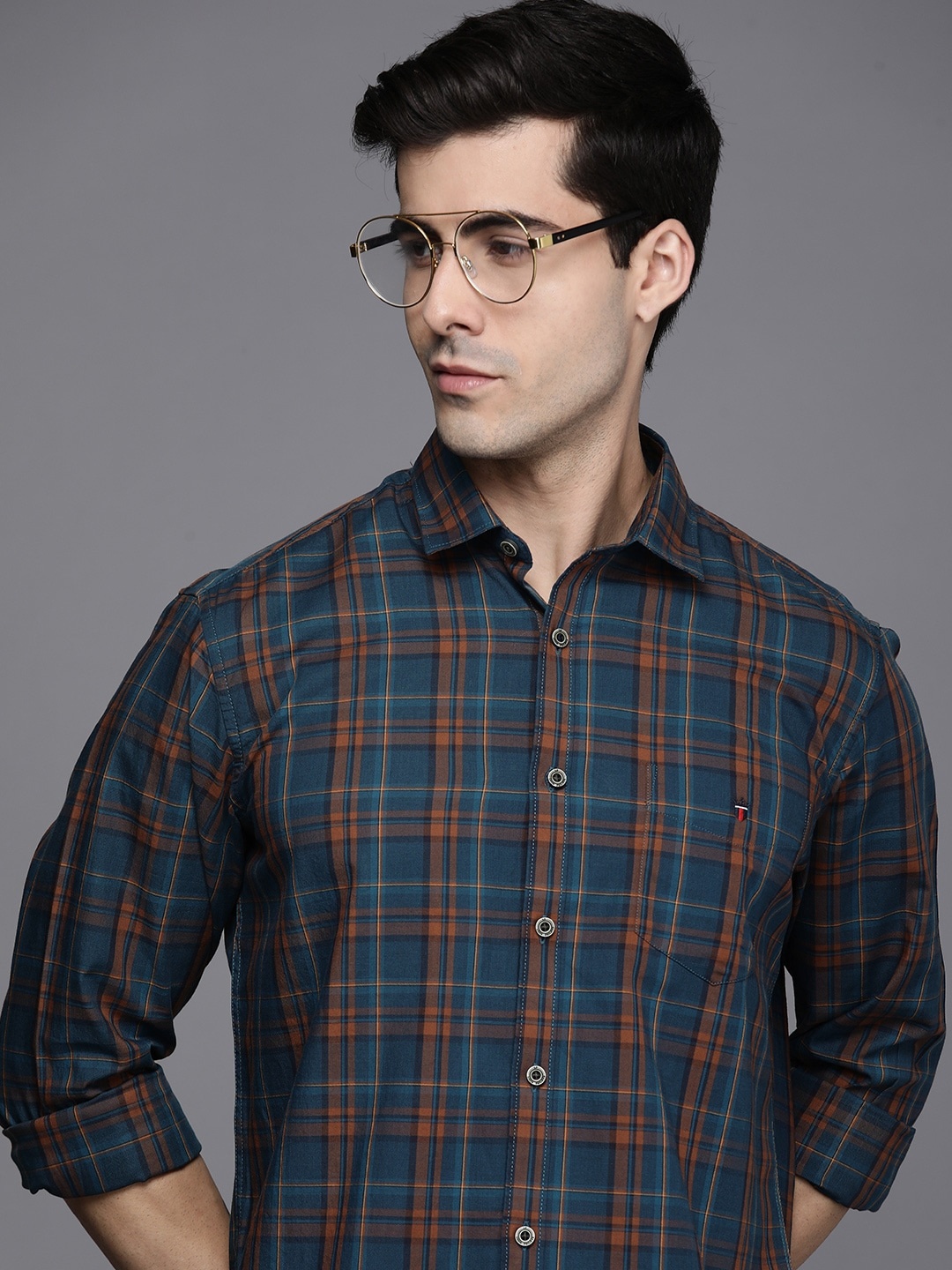 Louis Philippe Sport Men Teal Blue & Brown Slim Fit Checked Pure Cotton Casual Shirt
Louis Philippe Sport Men Teal Blue & Brown Slim Fit Checked Pure Cotton Casual Shirt