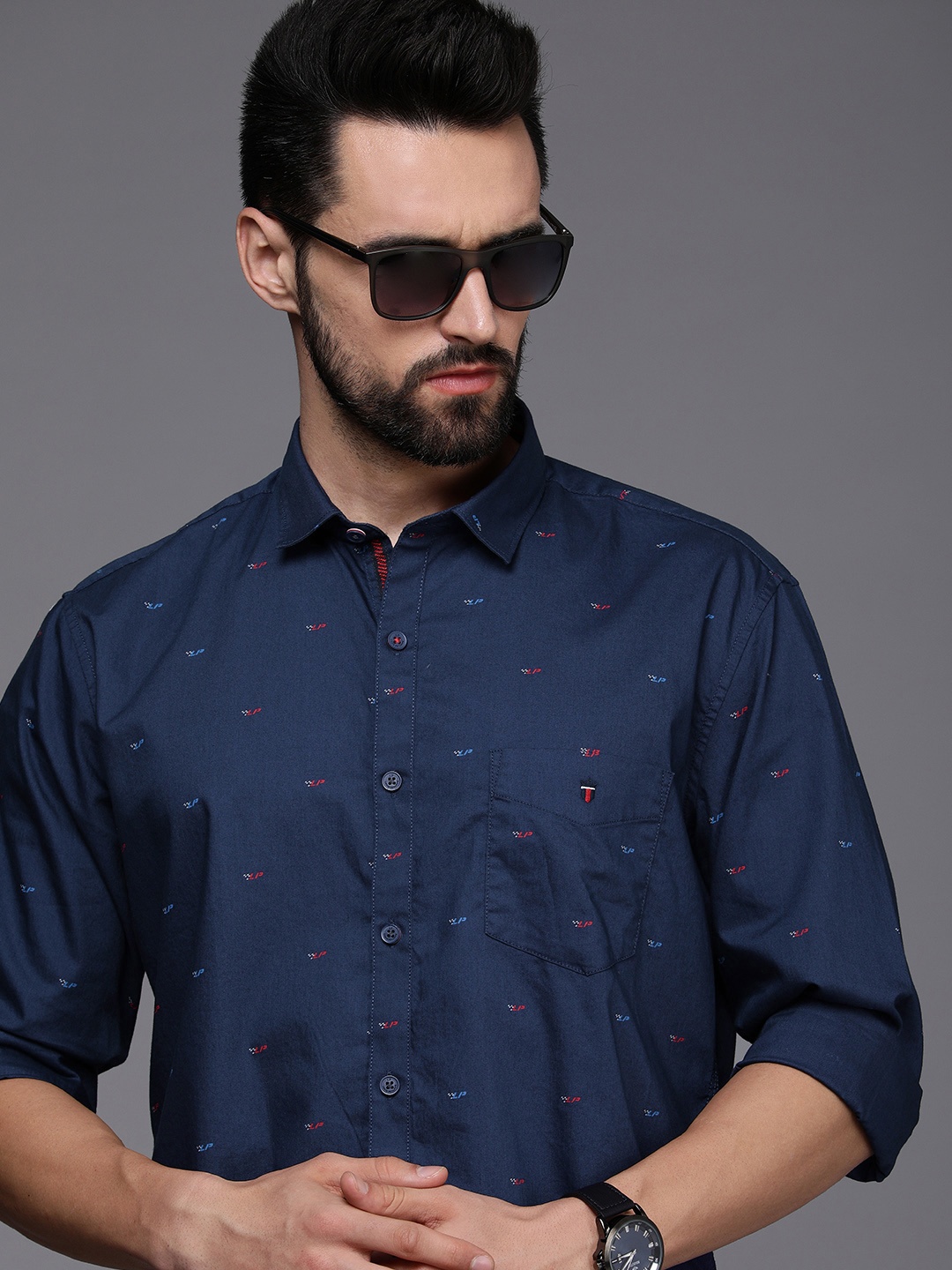 Louis Philippe Sport Men Blue & Red Brand Logo Printed Slim Fit Pure Cotton Casual Shirt
Louis Philippe Sport Men Blue & Red Brand Logo Printed Slim Fit Pure Cotton Casual Shirt