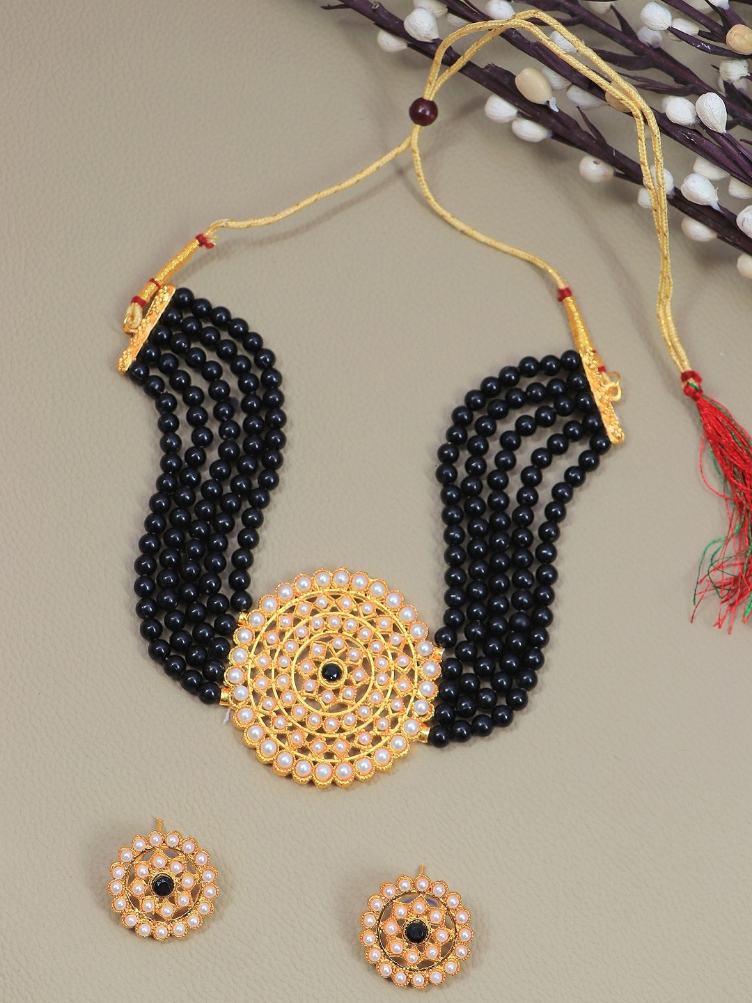 Crunchy Fashion Gold-Plated White Kundan-Studded Black Beaded Jewellery Set
Crunchy Fashion Gold-Plated White Kundan-Studded Black Beaded Jewellery Set