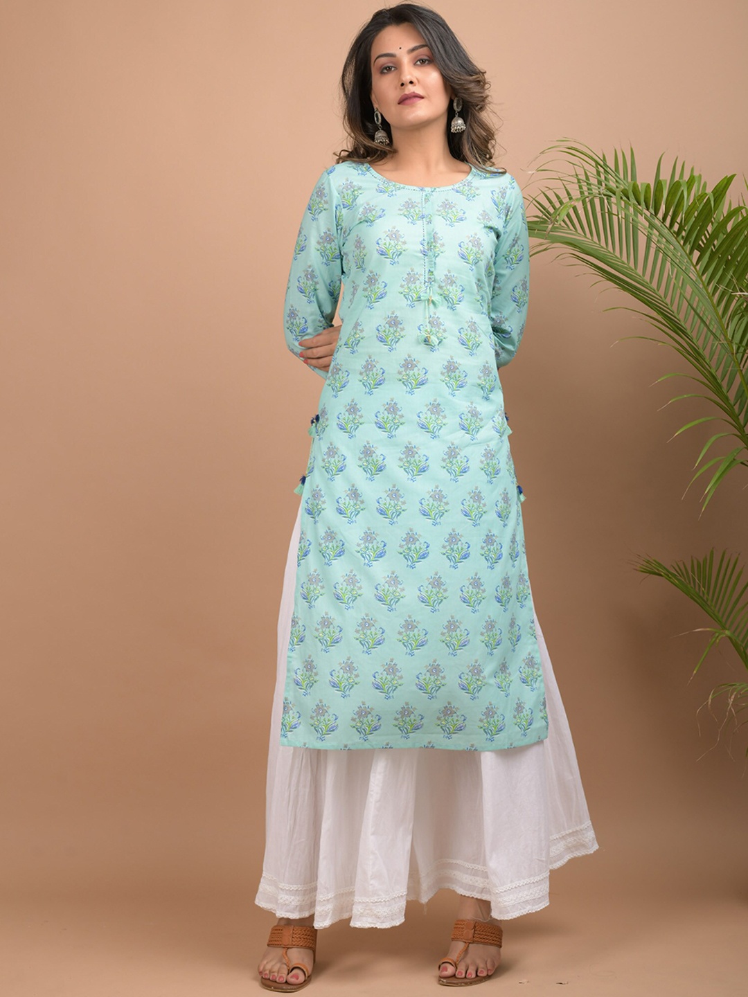 KAAJH Women Sea Green & White Ethnic Motifs Screen Printed Pure Cotton Kurta with Sharara
KAAJH Women Sea Green & White Ethnic Motifs Screen Printed Pure Cotton Kurta with Sharara