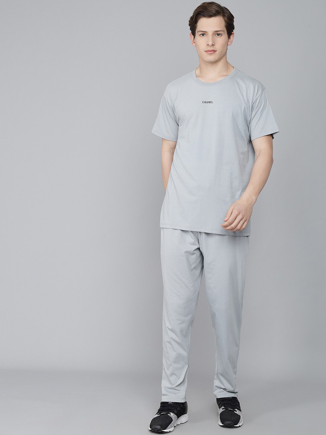 GRIFFEL Men Grey Melange Solid Pure Cotton T-shirt With Trousers 
GRIFFEL Men Grey Melange Solid Pure Cotton T-shirt With Trousers