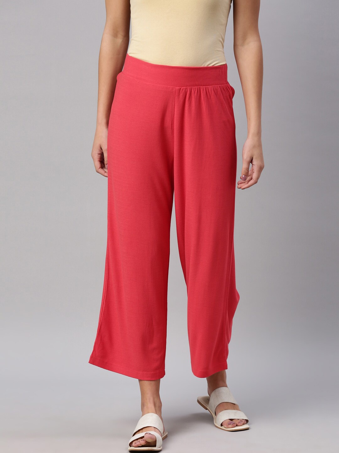 YCANF Women Red Solid Flared Palazzos
