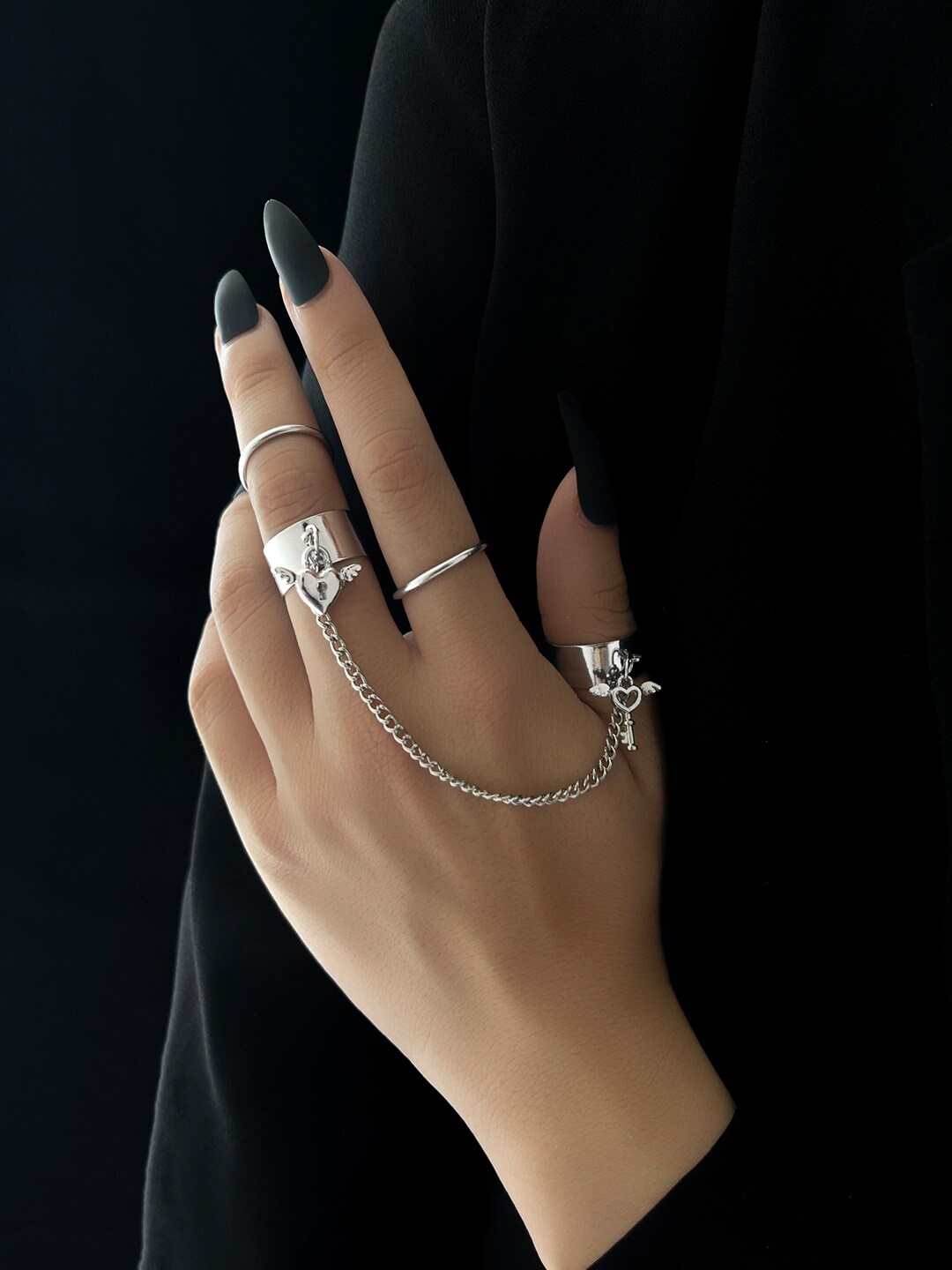 Shining Diva Fashion Set Of 4 Silver-Plated Boho Chain Linked Adjustable Finger Rings
Shining Diva Fashion Set Of 4 Silver-Plated Boho Chain Linked Adjustable Finger Rings