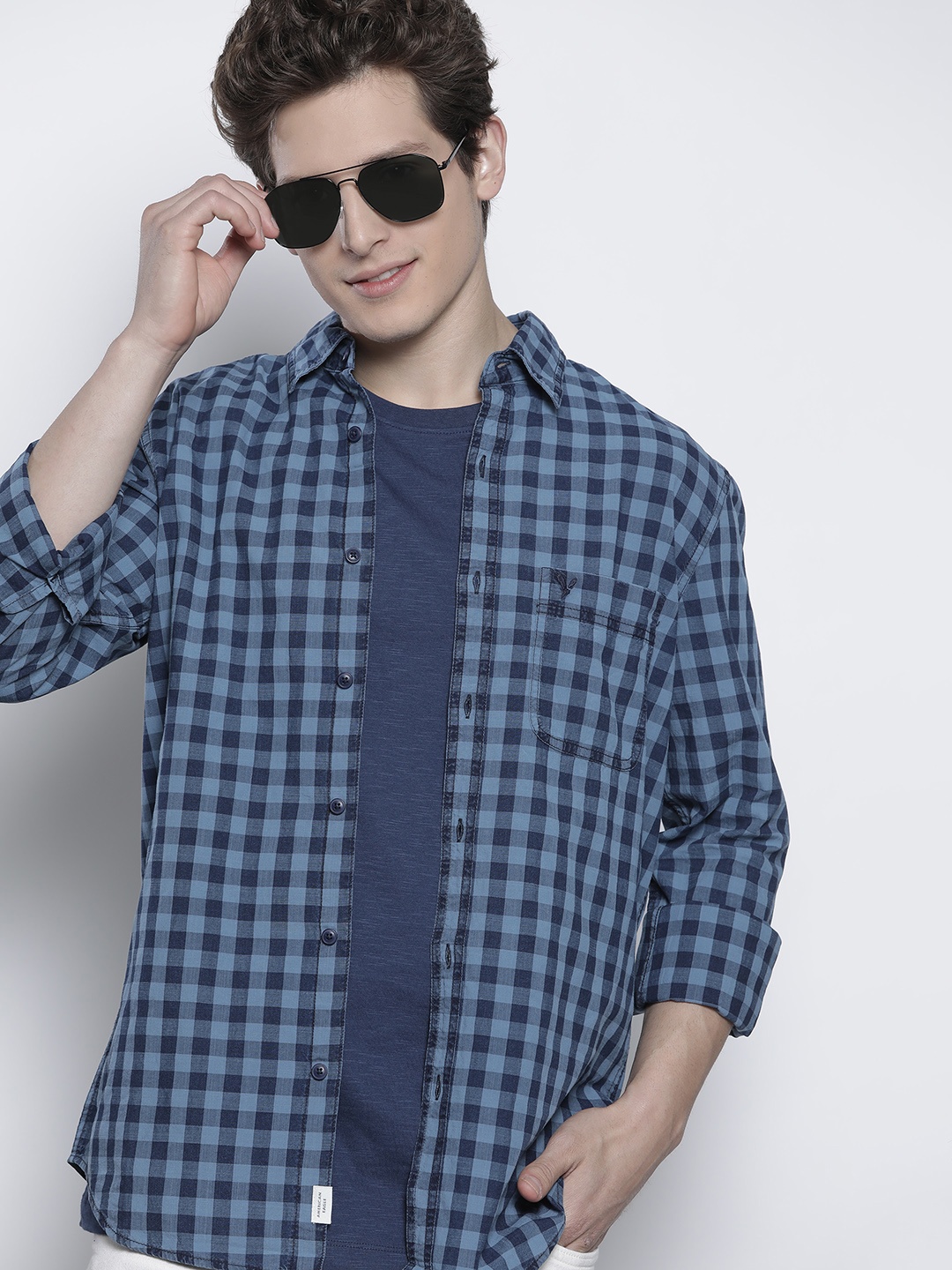 AMERICAN EAGLE OUTFITTERS Men Blue Slim Fit Gingham Checked Pure Cotton Casual Shirt
AMERICAN EAGLE OUTFITTERS Men Blue Slim Fit Gingham Checked Pure Cotton Casual Shirt