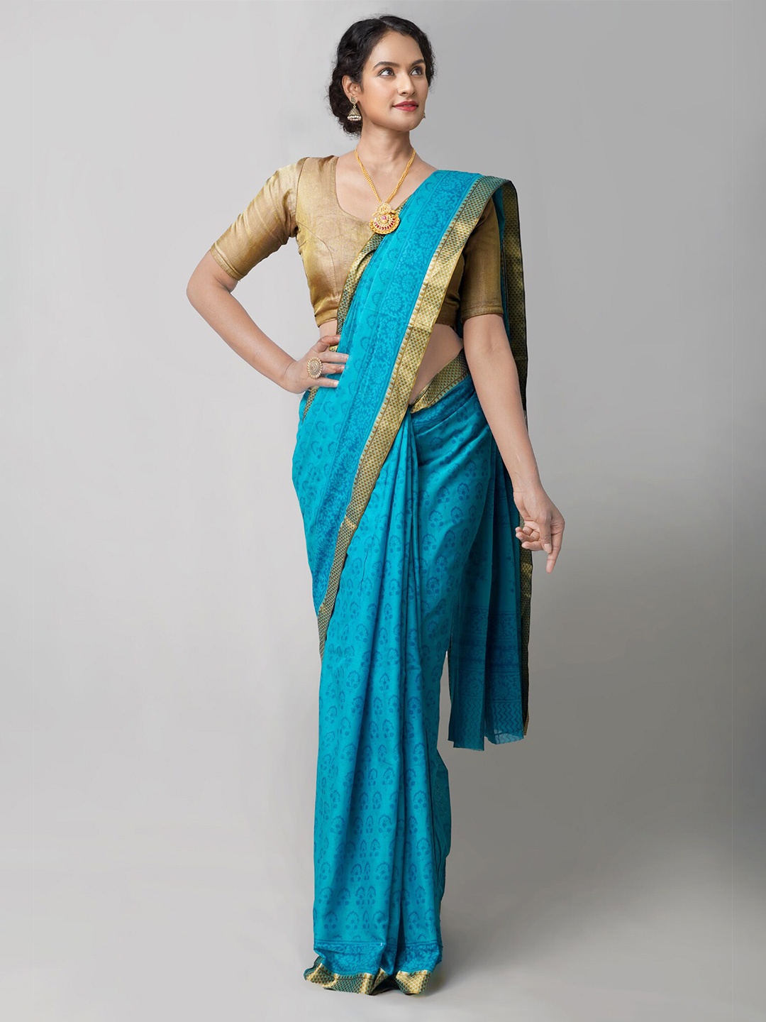 Unnati Silks Blue & Gold-Toned Ethnic Motifs Pure Cotton Block Print Saree
Unnati Silks Blue & Gold-Toned Ethnic Motifs Pure Cotton Block Print Saree