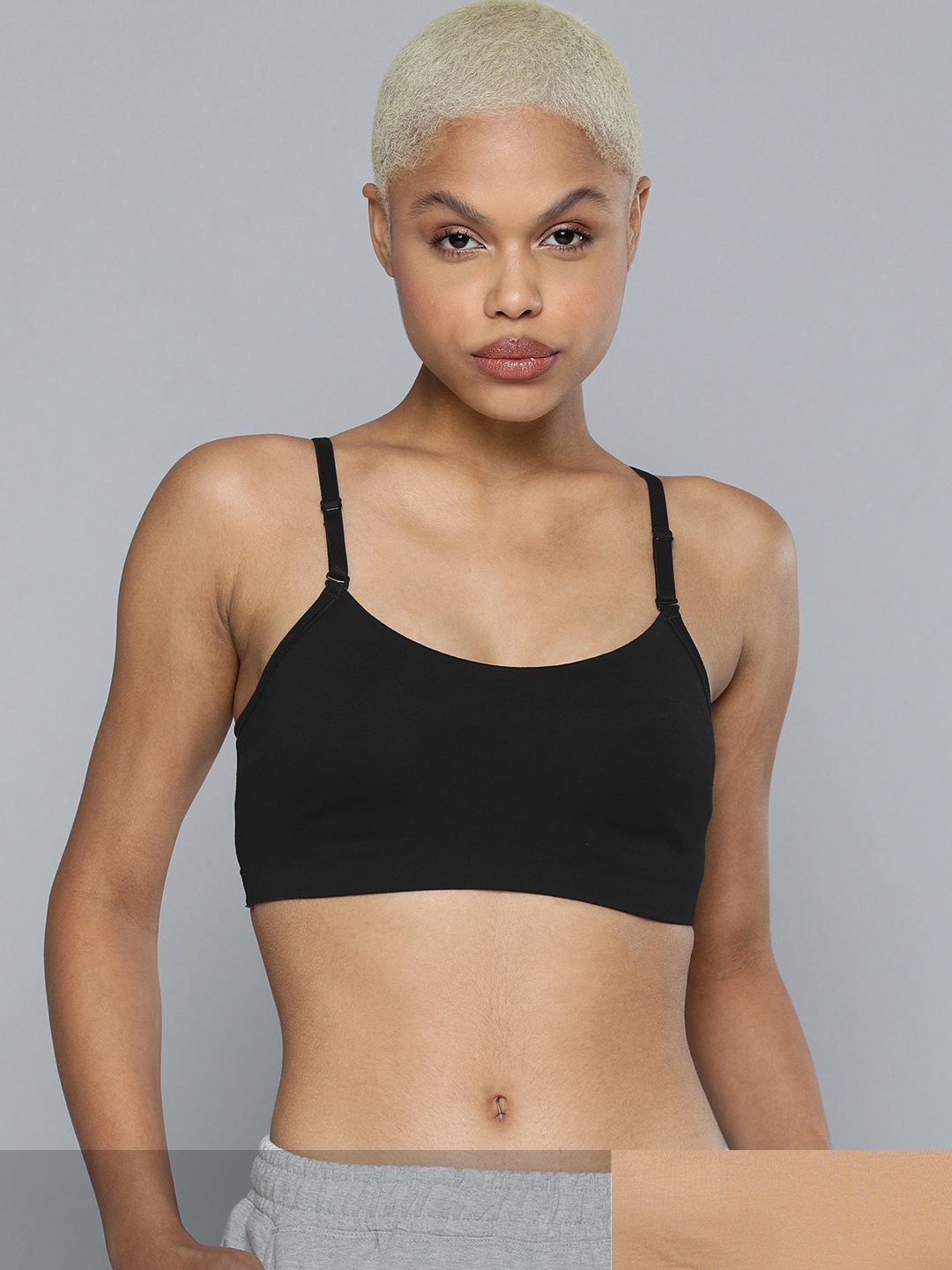 HRX By Hrithik Roshan Women Non Padded High Coverage Beige & Black Pack of 2 Cami Bra
HRX By Hrithik Roshan Women Non Padded High Coverage Beige & Black Pack of 2 Cami Bra