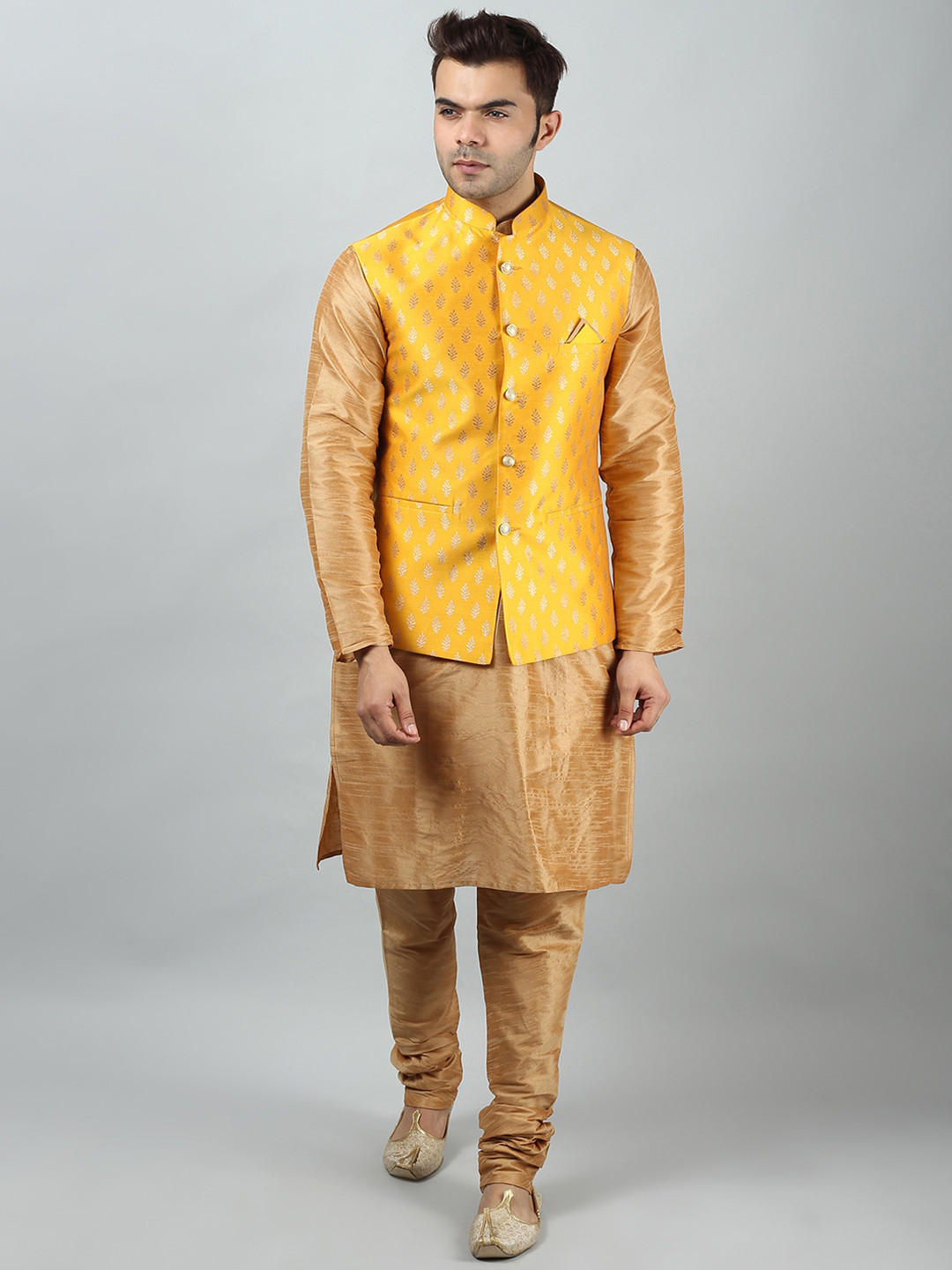 Uri and MacKenzie Men Khaki Ethnic Motifs Dupion Silk Kurta with Churidar & Nehru Jacket
Uri and MacKenzie Men Khaki Ethnic Motifs Dupion Silk Kurta with Churidar & Nehru Jacket