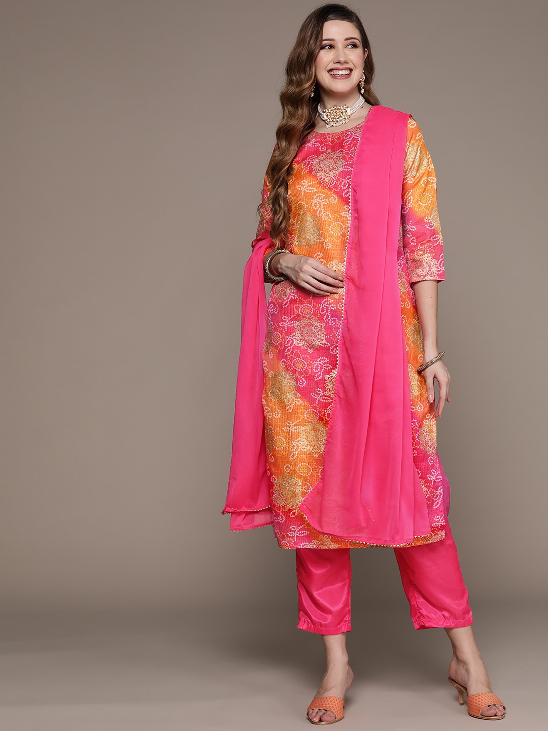 Ishin Women Pink & Yellow Bandhani Printed Gotta Patti Kurta with Trousers & Dupatta
Ishin Women Pink & Yellow Bandhani Printed Gotta Patti Kurta with Trousers & Dupatta