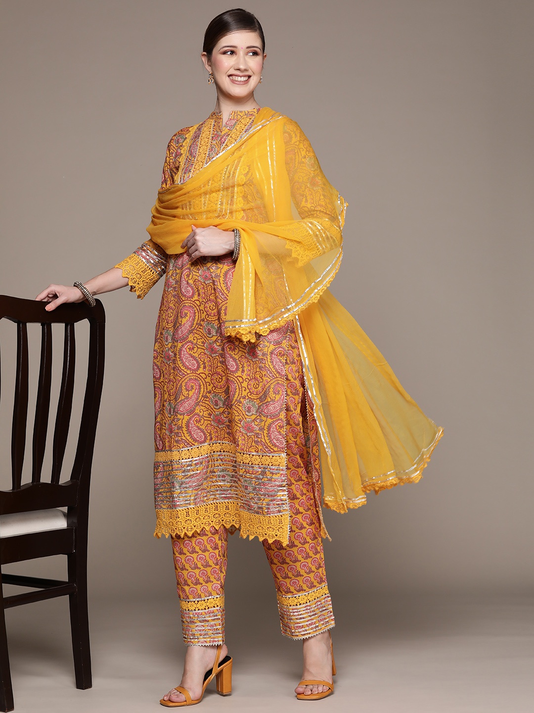 Ishin Women Mustard Yellow & Red Ethnic Motifs Embroidered Kurta with Trousers & Dupatta
Ishin Women Mustard Yellow & Red Ethnic Motifs Embroidered Kurta with Trousers & Dupatta