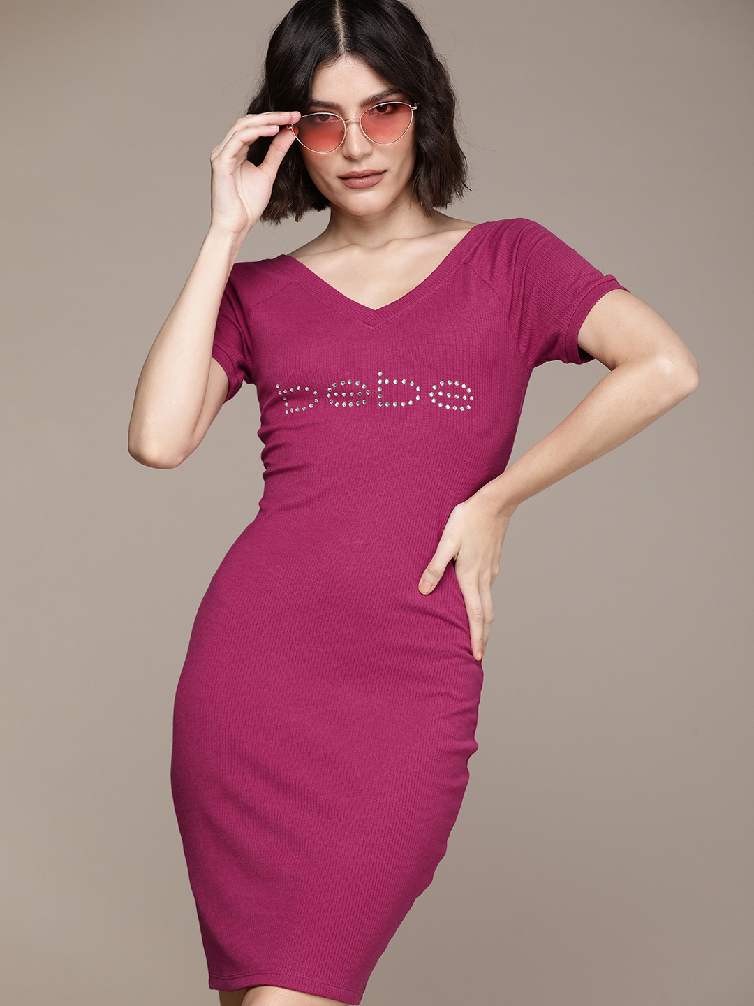 bebe Women Orchid Flower Essential Self Design V-Neck Bodycon Dress With Beads Detail, Fuchsia
bebe Women Orchid Flower Essential Self Design V-Neck Bodycon Dress With Beads Detail, Fuchsia