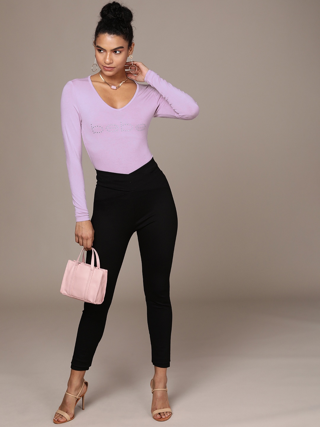 bebe Women Lavender Frost Essential Brand Logo Printed V-Neck Slim Fit T-shirt With Beads
bebe Women Lavender Frost Essential Brand Logo Printed V-Neck Slim Fit T-shirt With Beads