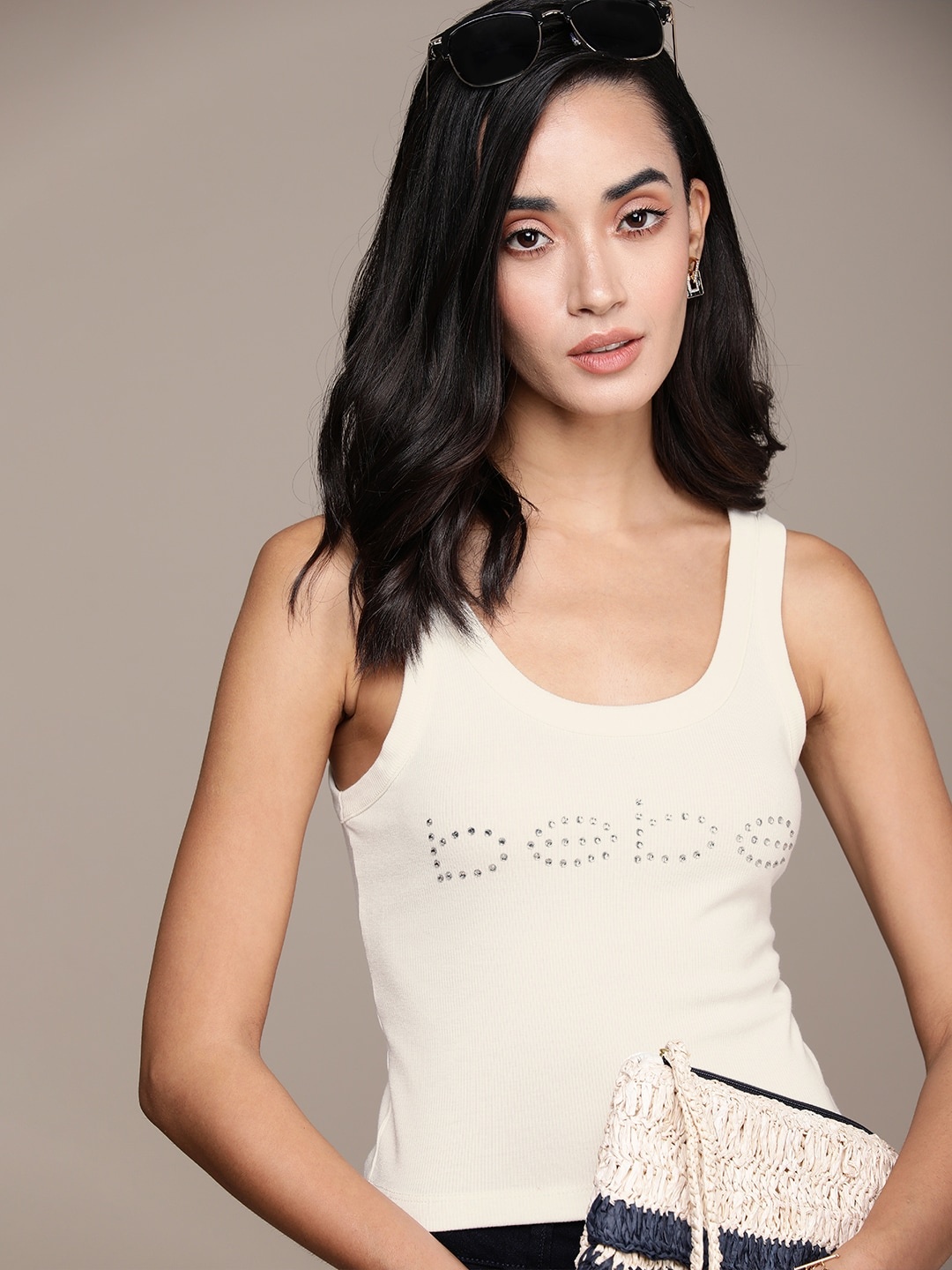 bebe Women Egret Essential Brand Logo Printed Sleeveless T-shirt With Beads Detail, White
bebe Women Egret Essential Brand Logo Printed Sleeveless T-shirt With Beads Detail, White