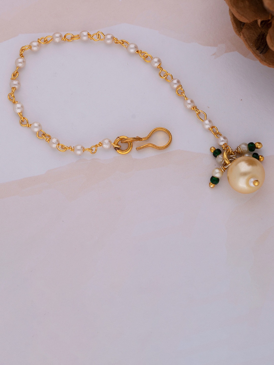 MORKANTH JEWELLERY Women Gold-Plated & White Pearl Studded Handcrafted Maang Tikka
MORKANTH JEWELLERY Women Gold-Plated & White Pearl Studded Handcrafted Maang Tikka