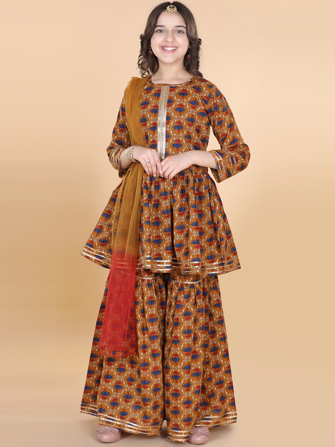 ADIVA Girls Mustard Yellow Floral Printed Empire Gotta Patti Pure Cotton Kurta with Sharara & With Dupatta
ADIVA Girls Mustard Yellow Floral Printed Empire Gotta Patti Pure Cotton Kurta with Sharara & With Dupatta