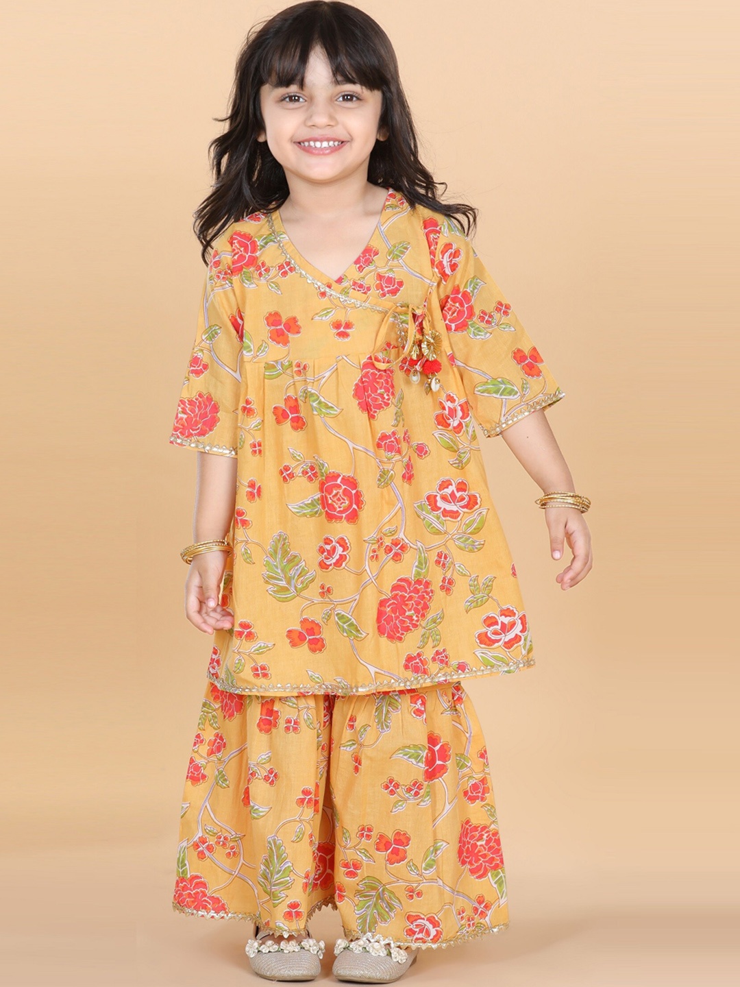 ADIVA Girls Yellow Floral Printed Angrakha Gotta Patti Pure Cotton Kurta with Sharara
ADIVA Girls Yellow Floral Printed Angrakha Gotta Patti Pure Cotton Kurta with Sharara