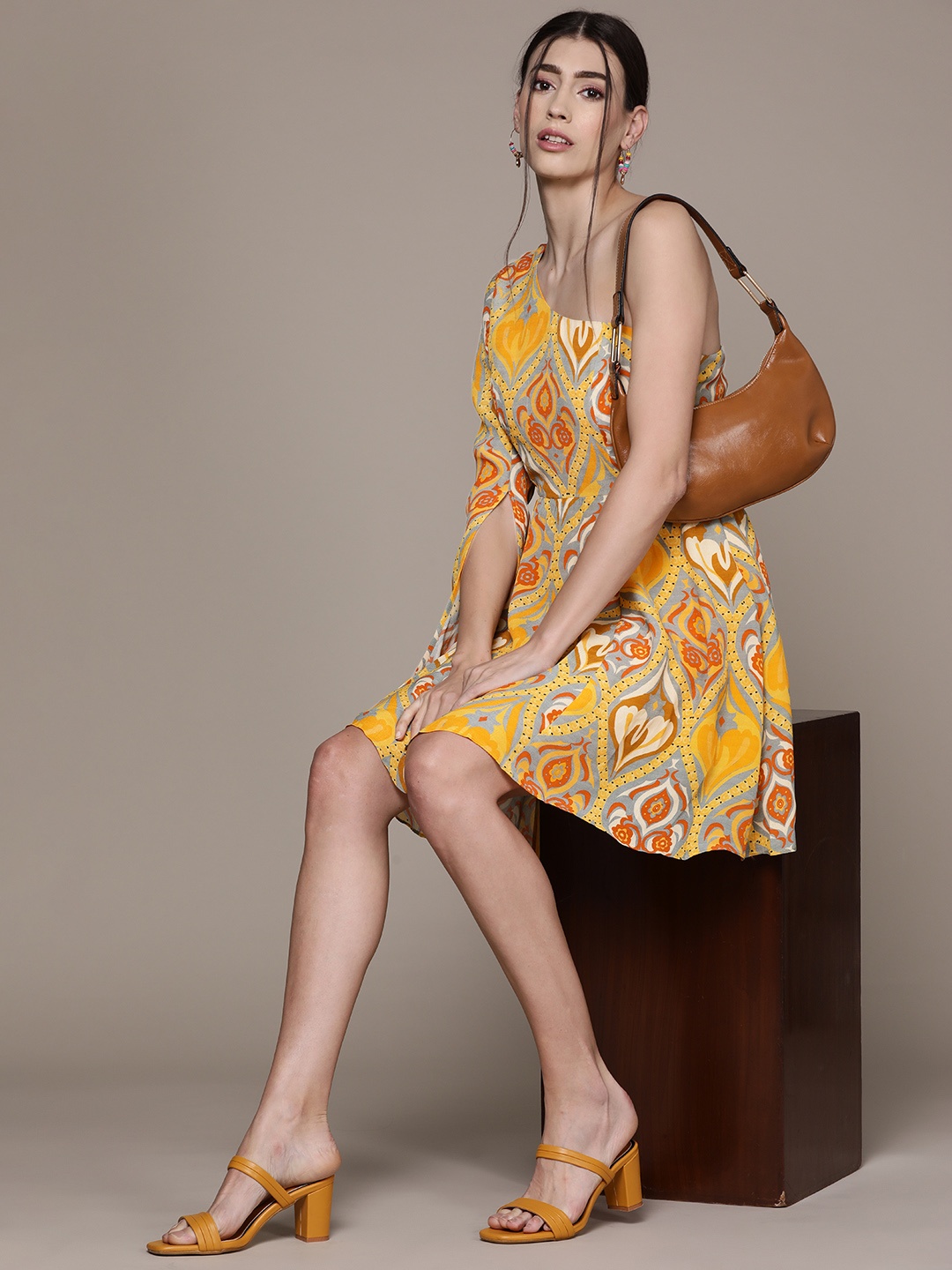 Label Ritu Kumar Women Yellow & Orange Ethnic Motifs One Shoulder Crepe A-Line Dress
Label Ritu Kumar Women Yellow & Orange Ethnic Motifs One Shoulder Crepe A-Line Dress