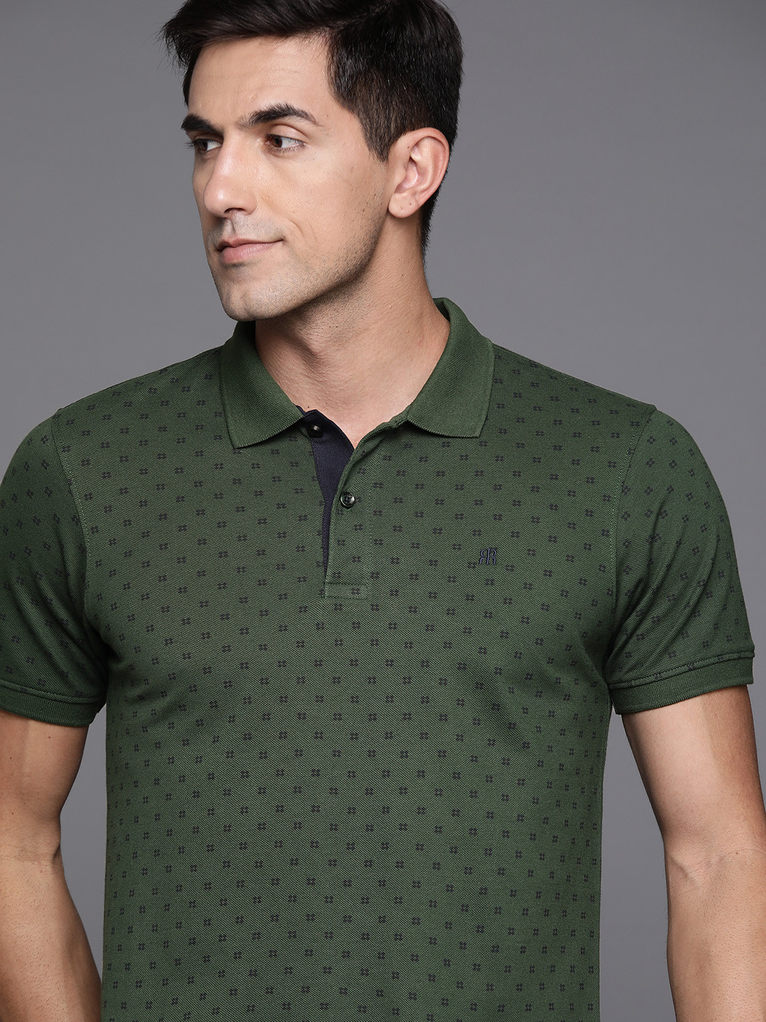 Raymond Men Olive Green & Navy Blue Pure Cotton Printed Polo Collar T-shirt
Raymond Men Olive Green & Navy Blue Pure Cotton Printed Polo Collar T-shirt