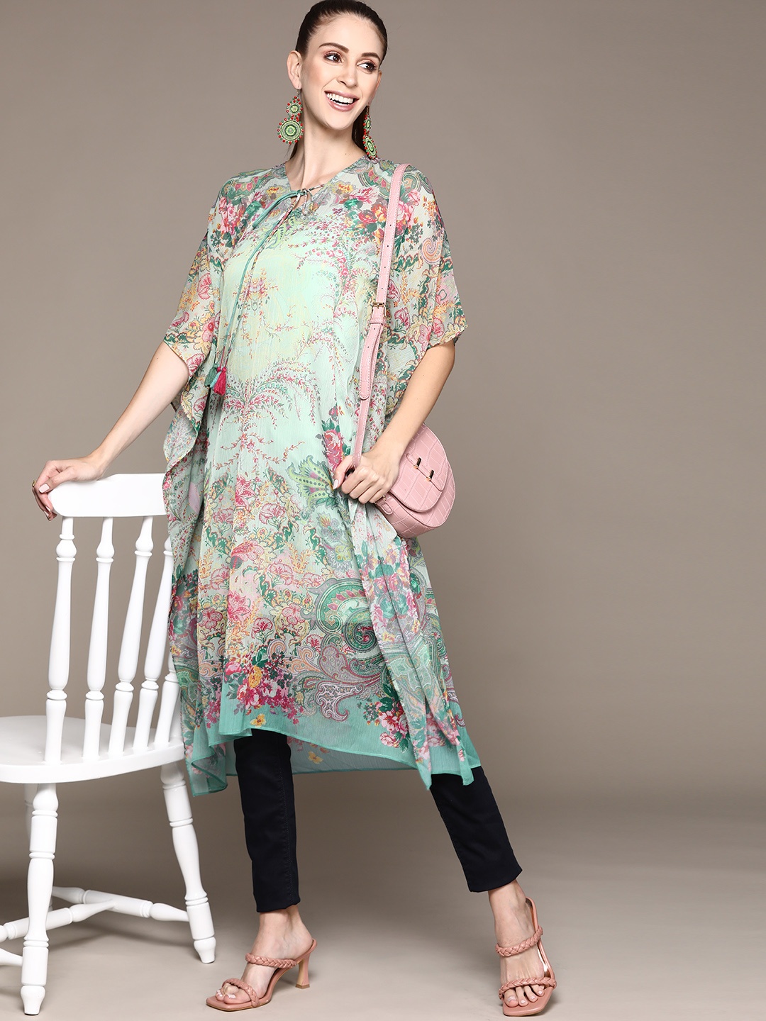 aarke Ritu Kumar Women Sea Green Floral Printed Flared Sleeves Kaftan Kurta with Camisole
aarke Ritu Kumar Women Sea Green Floral Printed Flared Sleeves Kaftan Kurta with Camisole