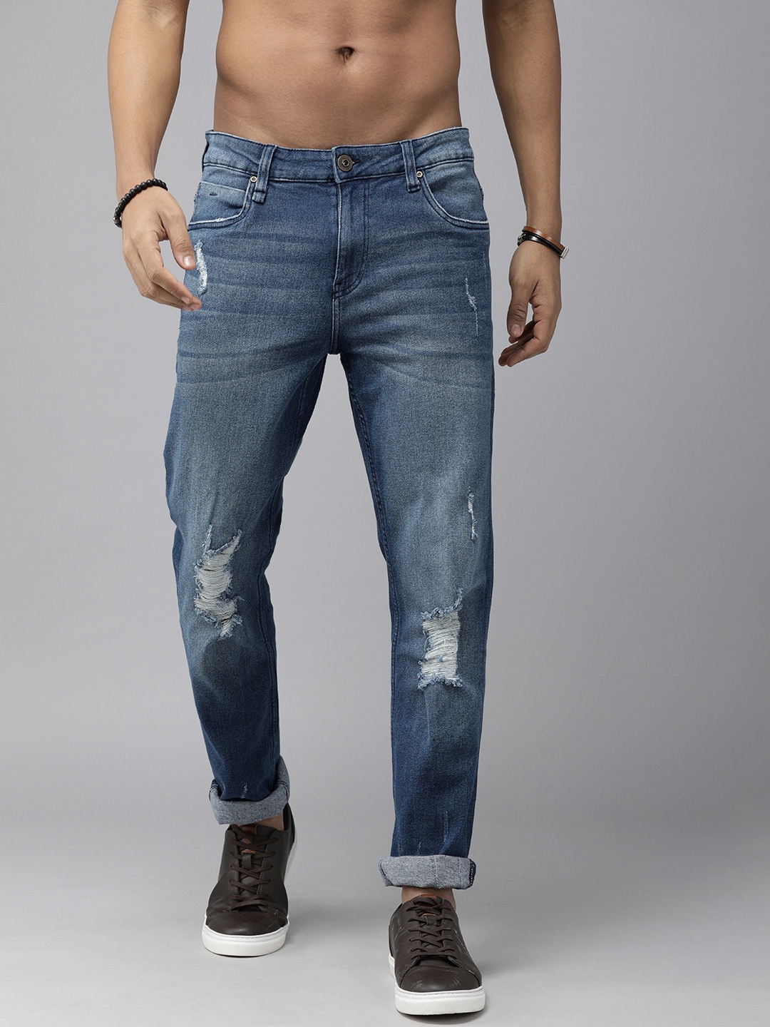 Roadster Men Blue Slim Tapered Fit Low-Rise Highly Distressed Light Fade Stretchable Jeans
Roadster Men Blue Slim Tapered Fit Low-Rise Highly Distressed Light Fade Stretchable Jeans