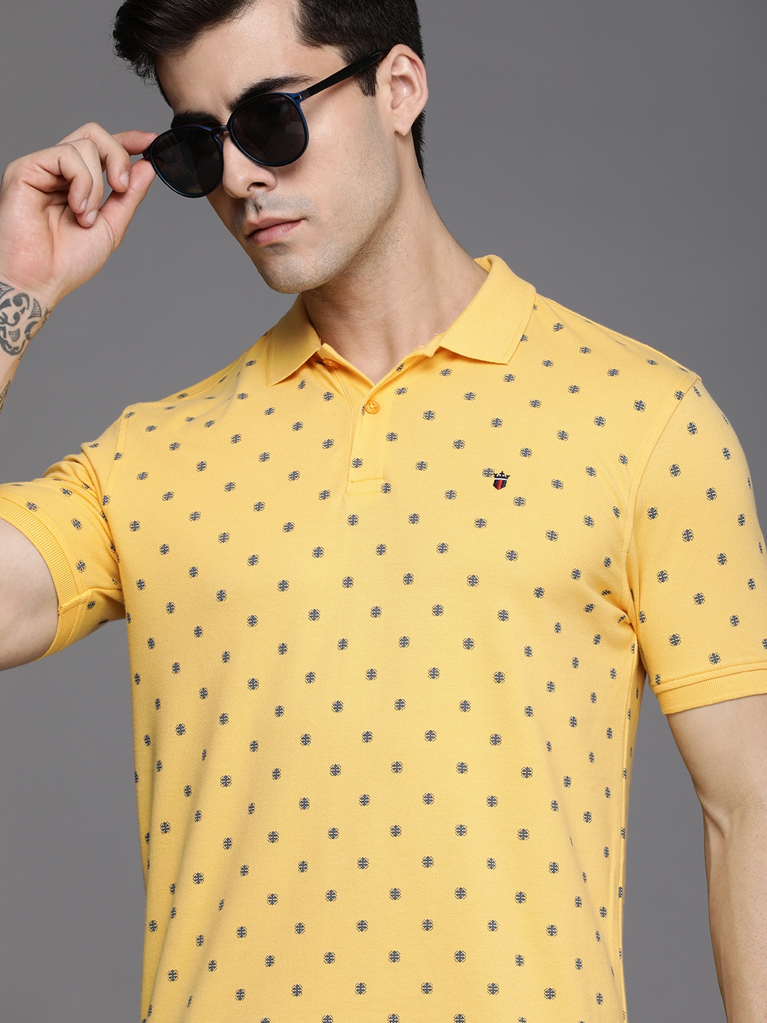 Louis Philippe Sport Men Yellow & Navy Blue Geometric Printed Polo Collar Slim Fit T-shirt
Louis Philippe Sport Men Yellow & Navy Blue Geometric Printed Polo Collar Slim Fit T-shirt