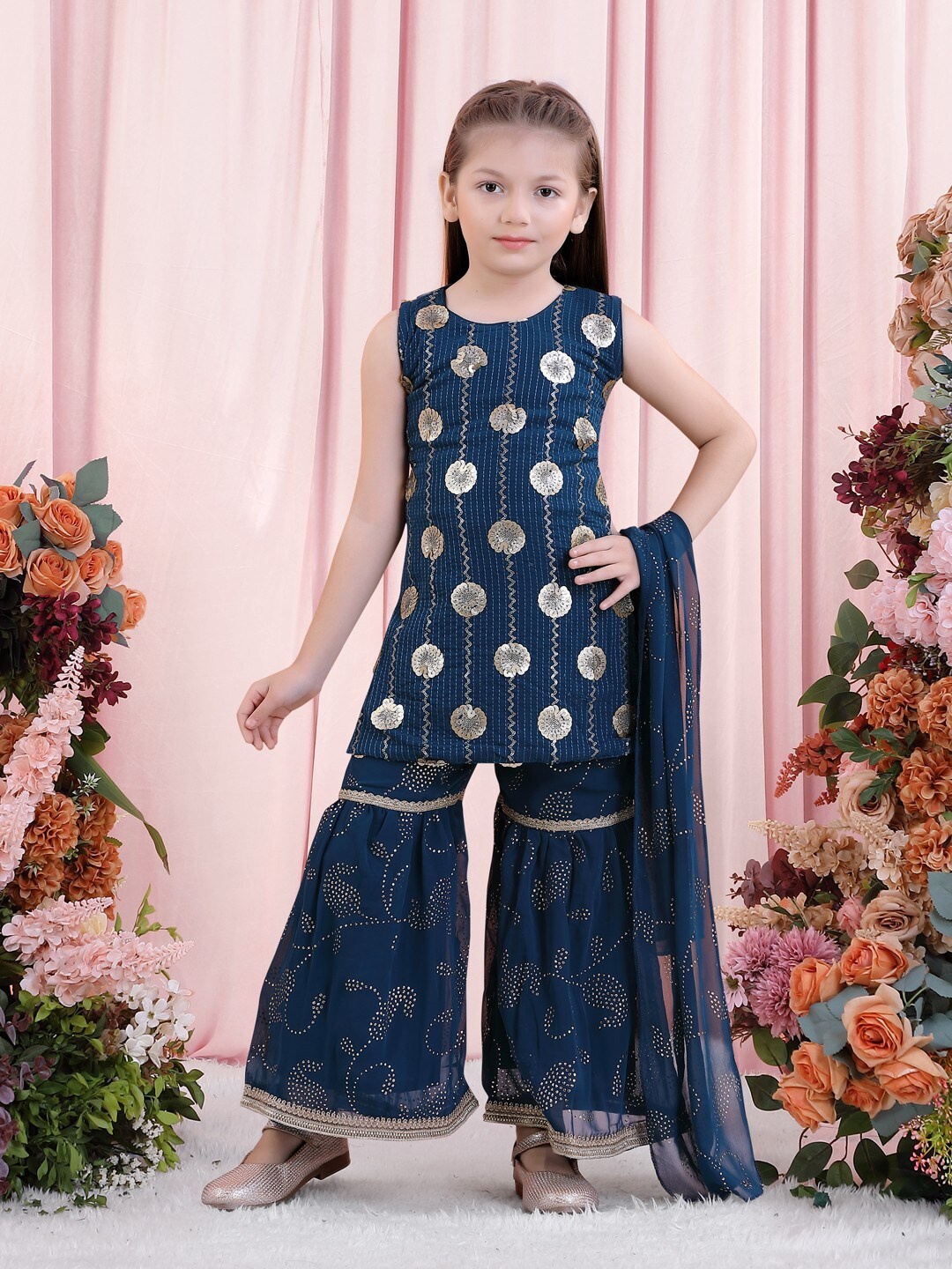 POPLINS Girls Blue Ethnic Motifs Embroidered Sequinned Pure Cotton Kurti with Sharara & With Dupatta
POPLINS Girls Blue Ethnic Motifs Embroidered Sequinned Pure Cotton Kurti with Sharara & With Dupatta