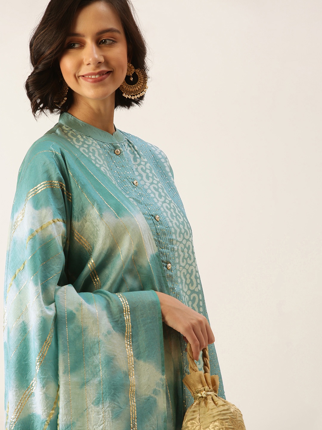 SWAGG INDIA Women Sea Green Handblock Print Sequinned Liva Kurta with Trousers & Dupatta
SWAGG INDIA Women Sea Green Handblock Print Sequinned Liva Kurta with Trousers & Dupatta