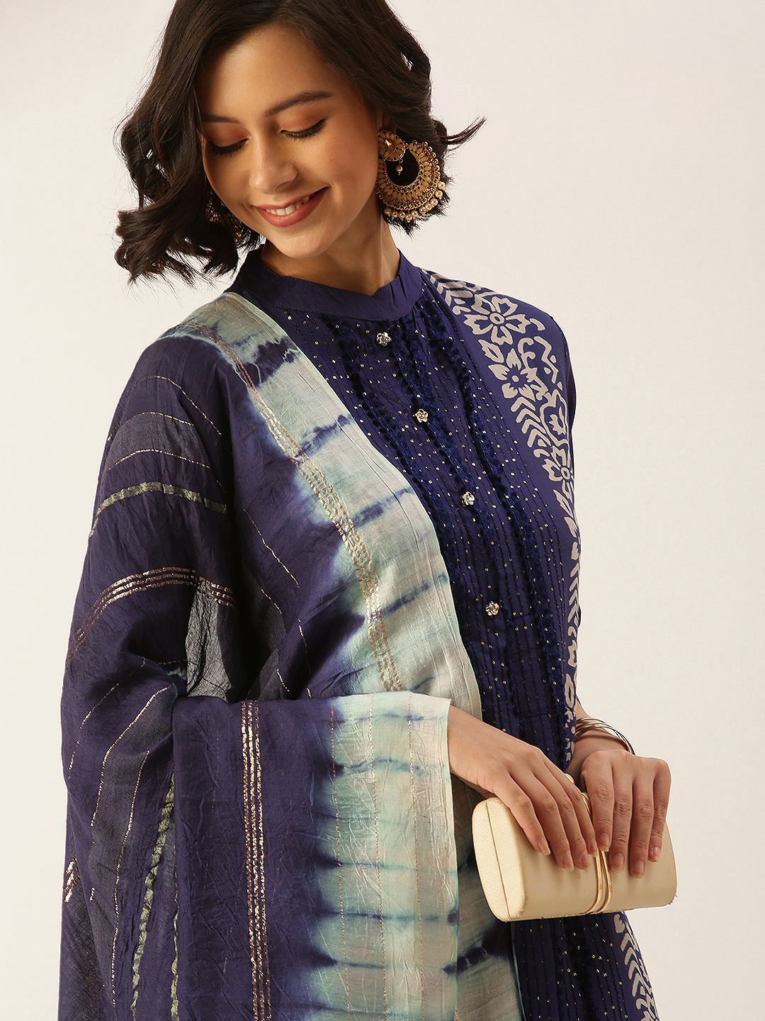SWAGG INDIA Women Navy Blue Handblock Print Sequinned Liva Kurta with Trousers & Dupatta
SWAGG INDIA Women Navy Blue Handblock Print Sequinned Liva Kurta with Trousers & Dupatta
