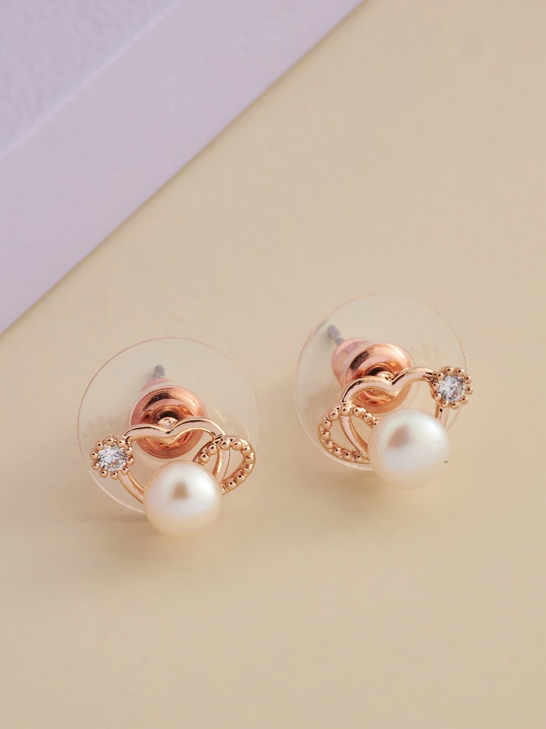 Kushal's Fashion Jewellery Rose Gold-Toned & White Rose Gold-Plated CZ Studded Earrings
Kushal's Fashion Jewellery Rose Gold-Toned & White Rose Gold-Plated CZ Studded Earrings