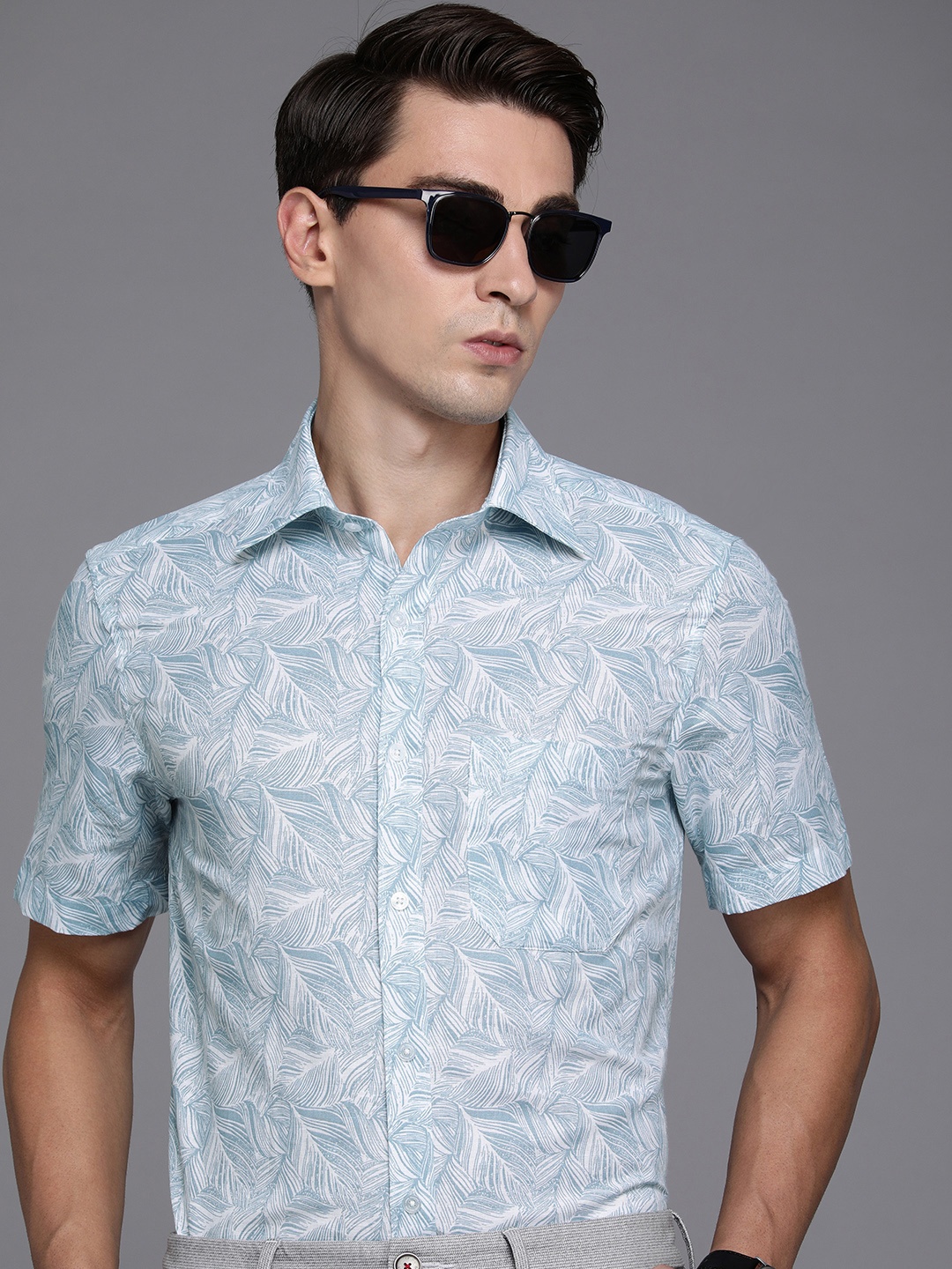 Louis Philippe Men Blue And White Classic Tropical Printed Cotton Linen Casual Shirt
Louis Philippe Men Blue And White Classic Tropical Printed Cotton Linen Casual Shirt