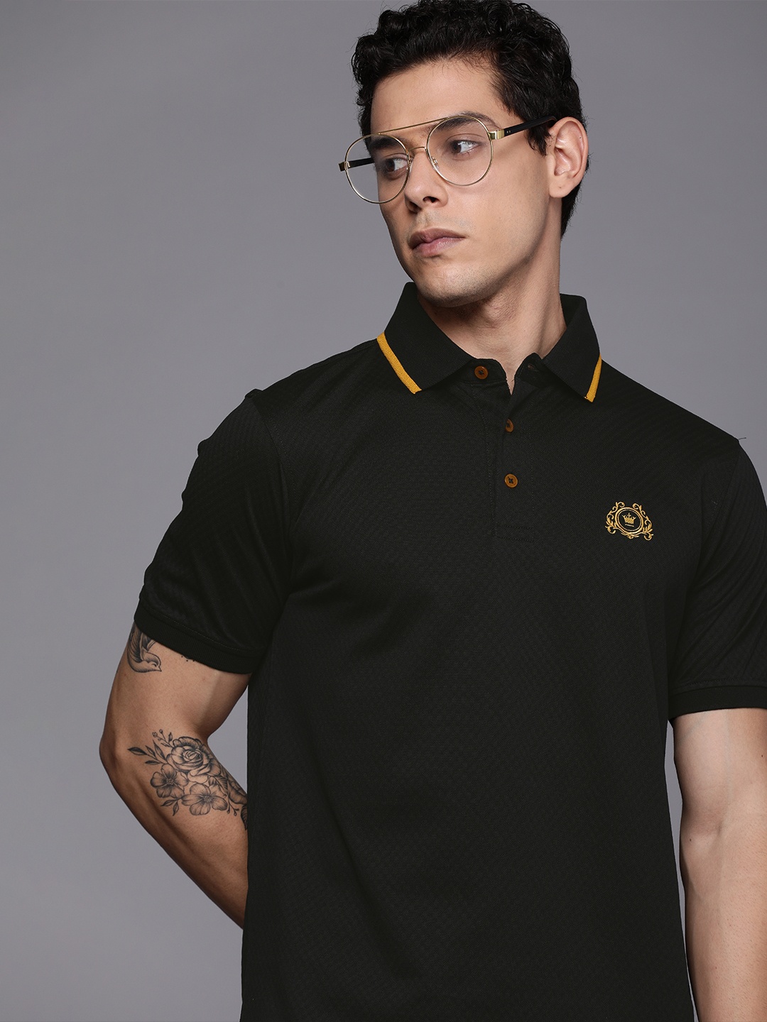 Louis Philippe Men Black & Mustard Yellow Self Design Polo Collar Pure Cotton T-shirt
Louis Philippe Men Black & Mustard Yellow Self Design Polo Collar Pure Cotton T-shirt