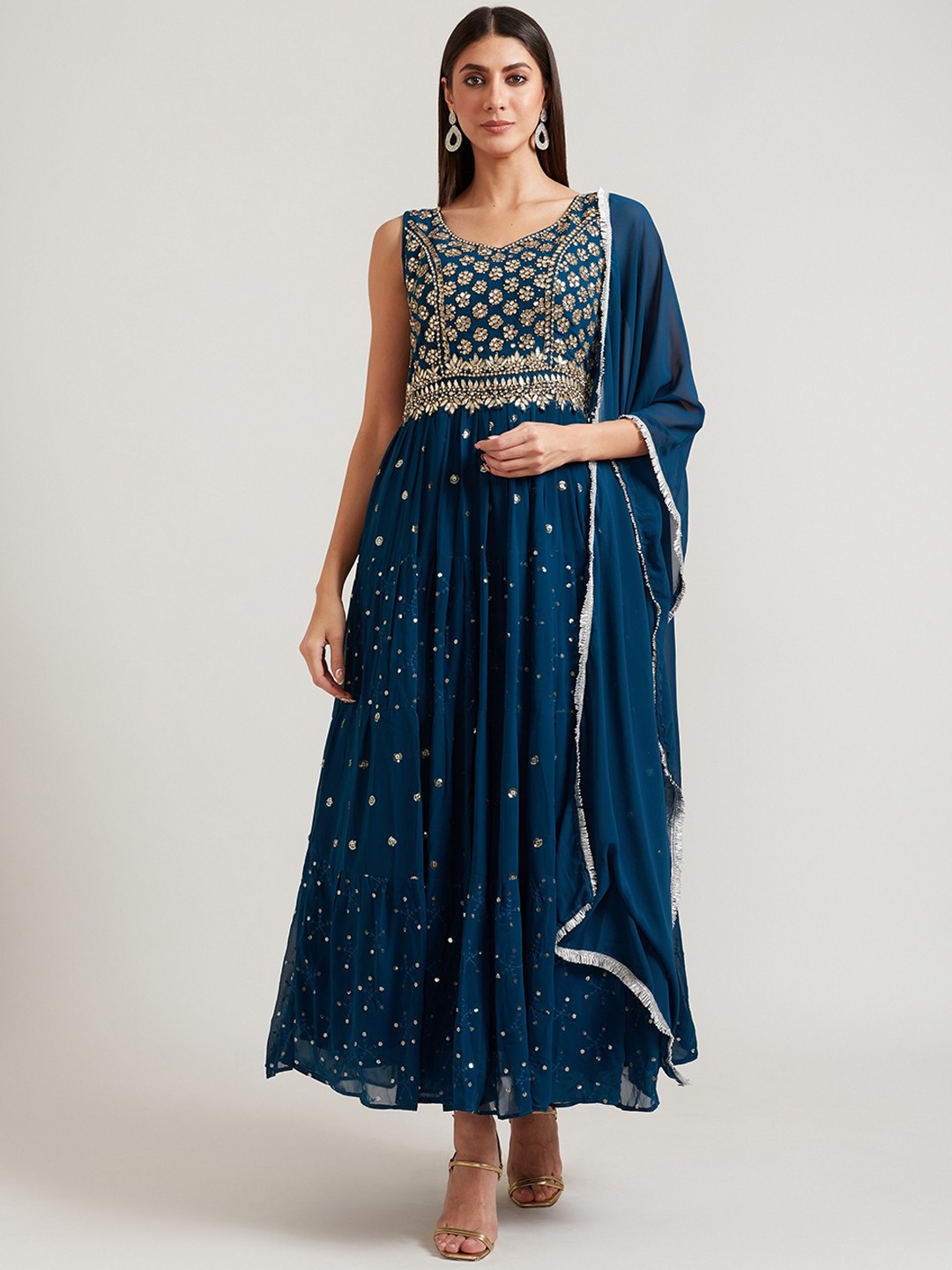 Neerus Women Blue Ethnic Motifs Printed Sequinned Kurta with Palazzos & With Dupatta
Neerus Women Blue Ethnic Motifs Printed Sequinned Kurta with Palazzos & With Dupatta