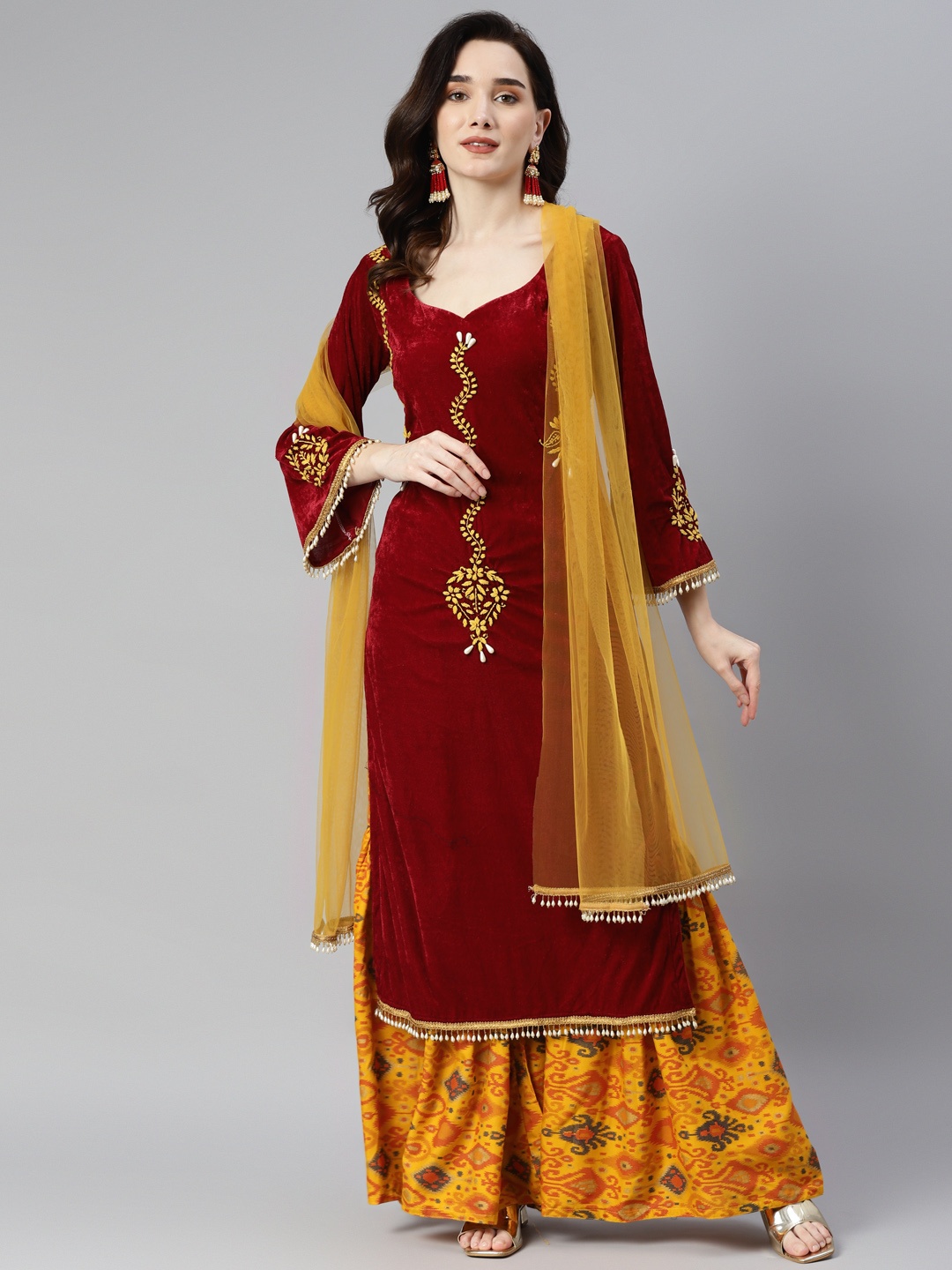 SHADES OF FAASHION Women Maroon Ethnic Motifs Embroidered Chikankari Velvet Kurta with Palazzos & With Dupatta
SHADES OF FAASHION Women Maroon Ethnic Motifs Embroidered Chikankari Velvet Kurta with Palazzos & With Dupatta