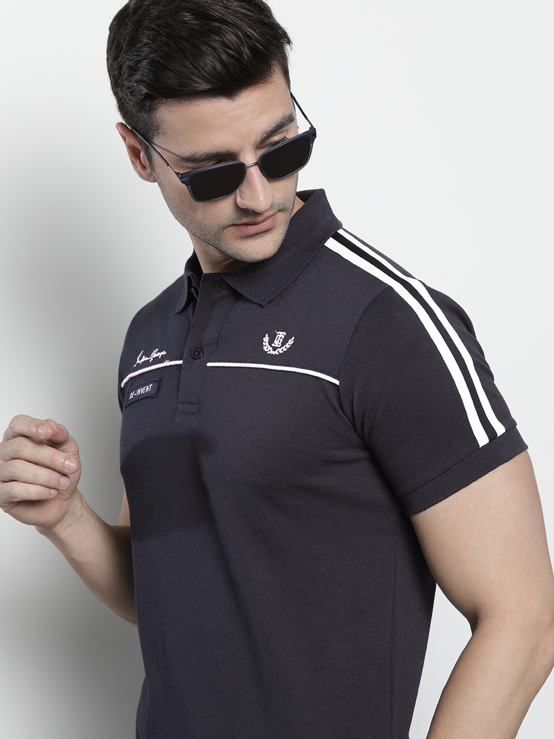 The Indian Garage Co Men Navy Blue Solid Polo Collar Applique Detail Slim Fit T-shirt
The Indian Garage Co Men Navy Blue Solid Polo Collar Applique Detail Slim Fit T-shirt