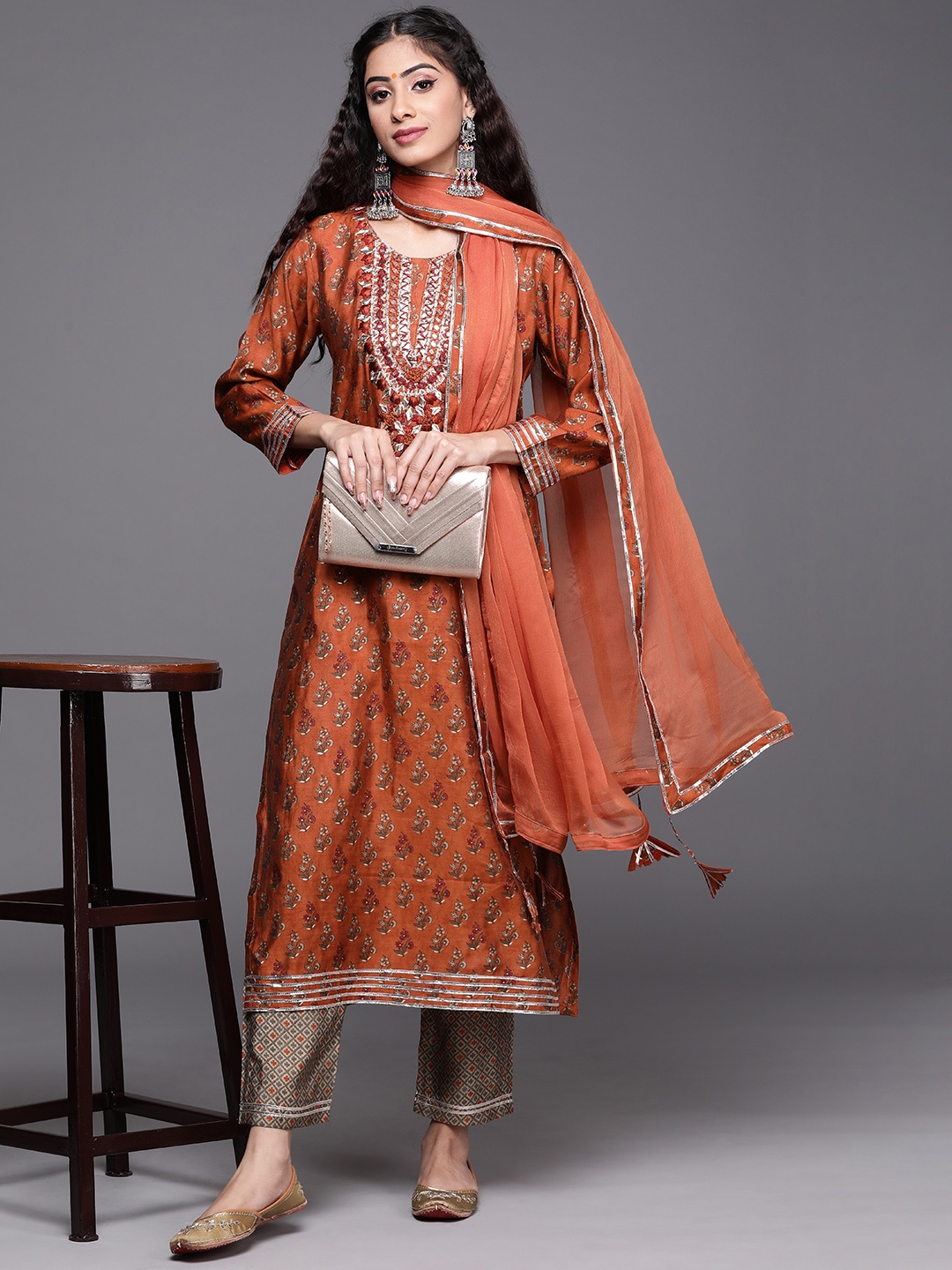 KSUT Women Orange Ethnic Motifs Embroidered Gotta Patti Kurta with Trousers & With Dupatta
KSUT Women Orange Ethnic Motifs Embroidered Gotta Patti Kurta with Trousers & With Dupatta