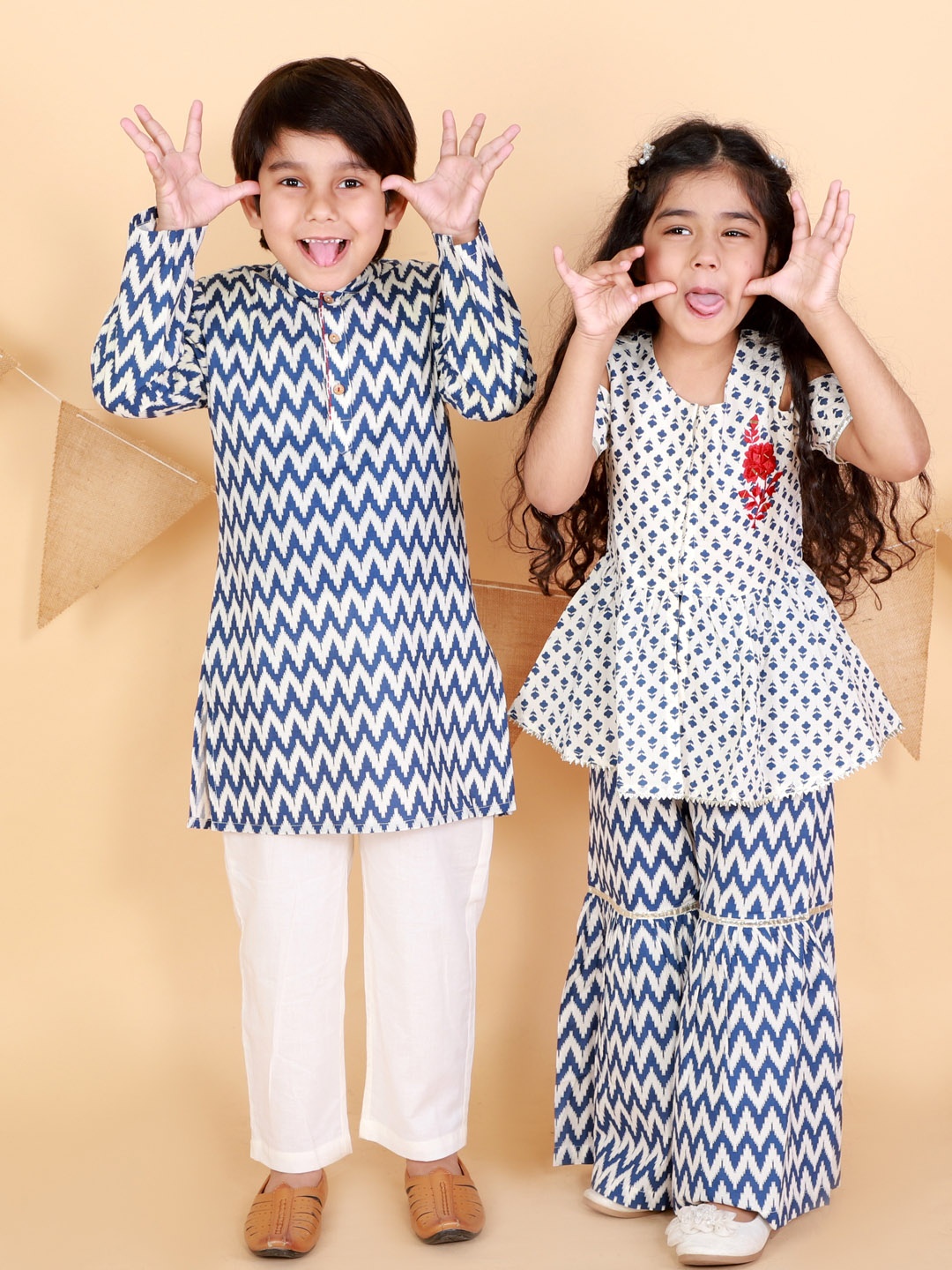 LIL DRAMA Boys Blue Ethnic Motifs Printed Angrakha Thread Work Pure Cotton Kurti with Pyjamas
LIL DRAMA Boys Blue Ethnic Motifs Printed Angrakha Thread Work Pure Cotton Kurti with Pyjamas