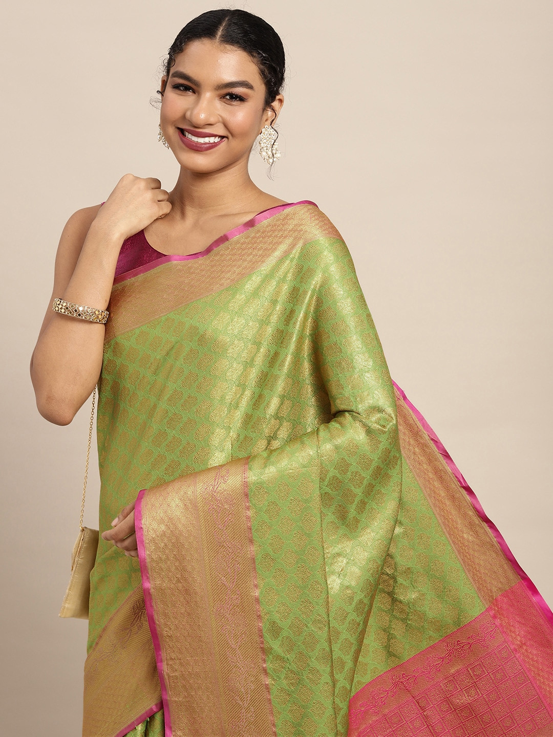 Silk Land Green & Golden Ethnic Motifs Zari Pure Silk Kanjeevaram Saree
Silk Land Green & Golden Ethnic Motifs Zari Pure Silk Kanjeevaram Saree