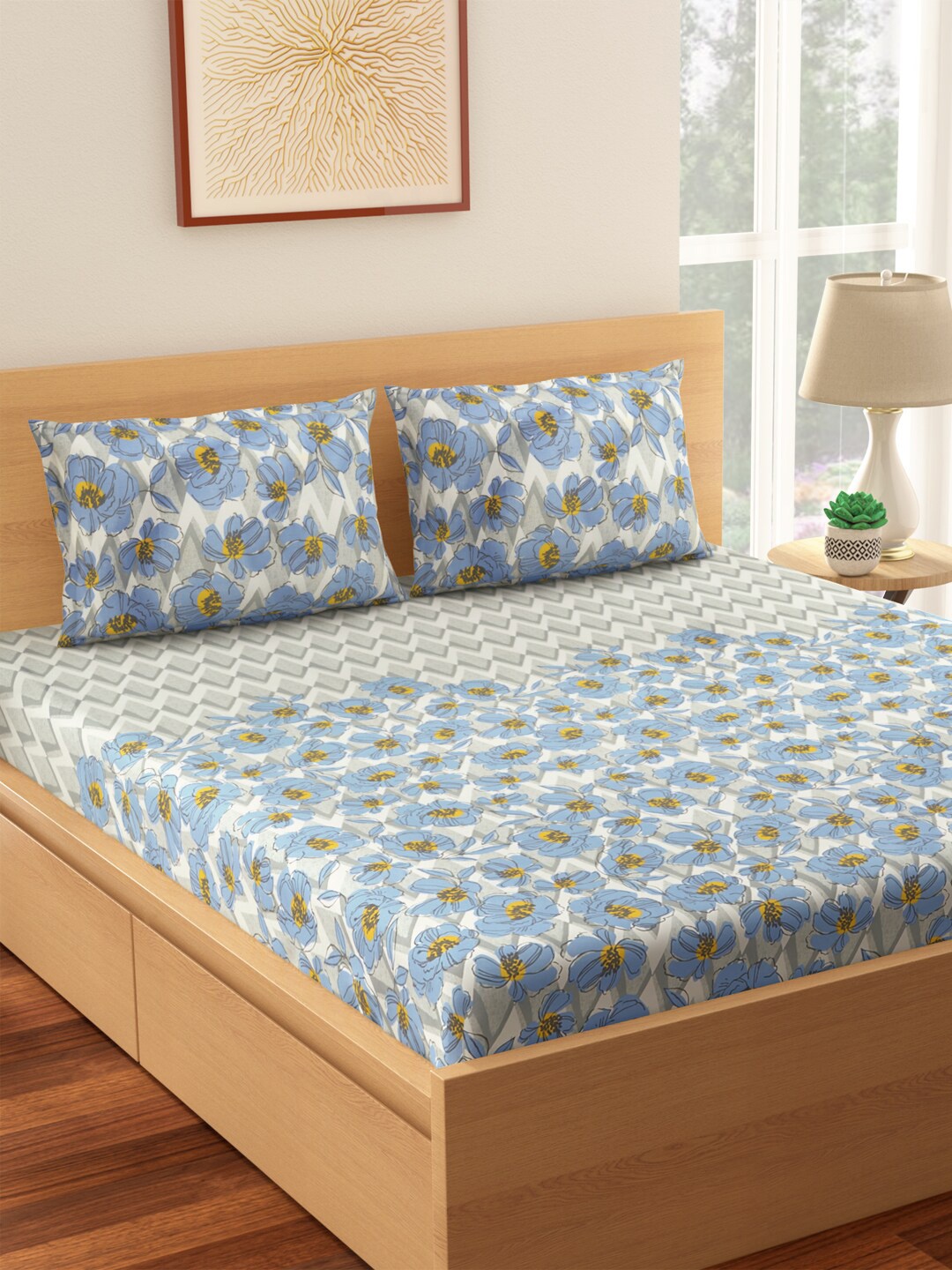 Living scapes by Pantaloons Blue & Grey Pure Cotton 210 TC King Bedsheet & 2 Pillow Covers
Living scapes by Pantaloons Blue & Grey Pure Cotton 210 TC King Bedsheet & 2 Pillow Covers