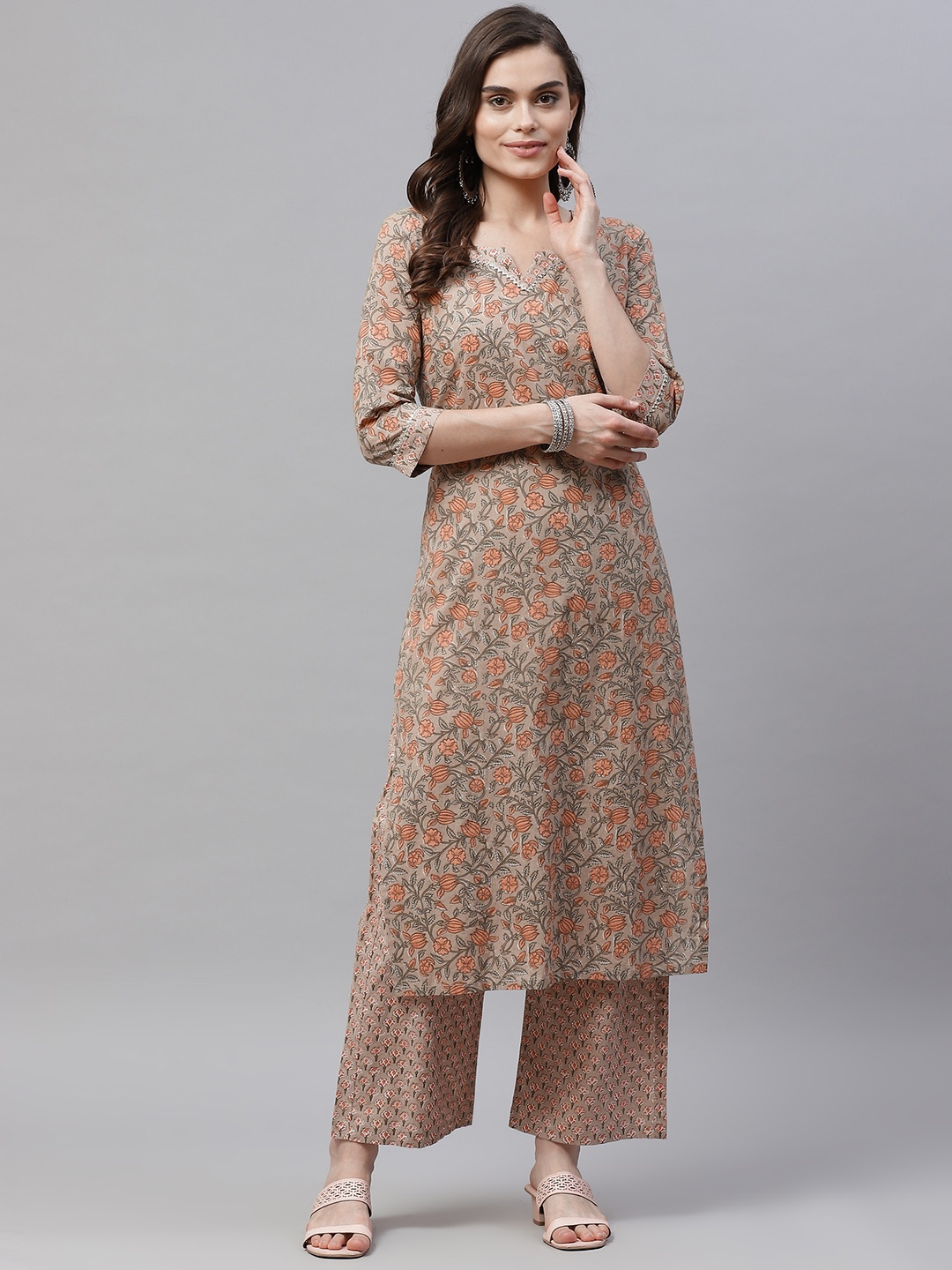 MIRAVAN Women Brown Ethnic Motifs Printed Gotta Patti Pure Cotton Kurta with Palazzos
MIRAVAN Women Brown Ethnic Motifs Printed Gotta Patti Pure Cotton Kurta with Palazzos